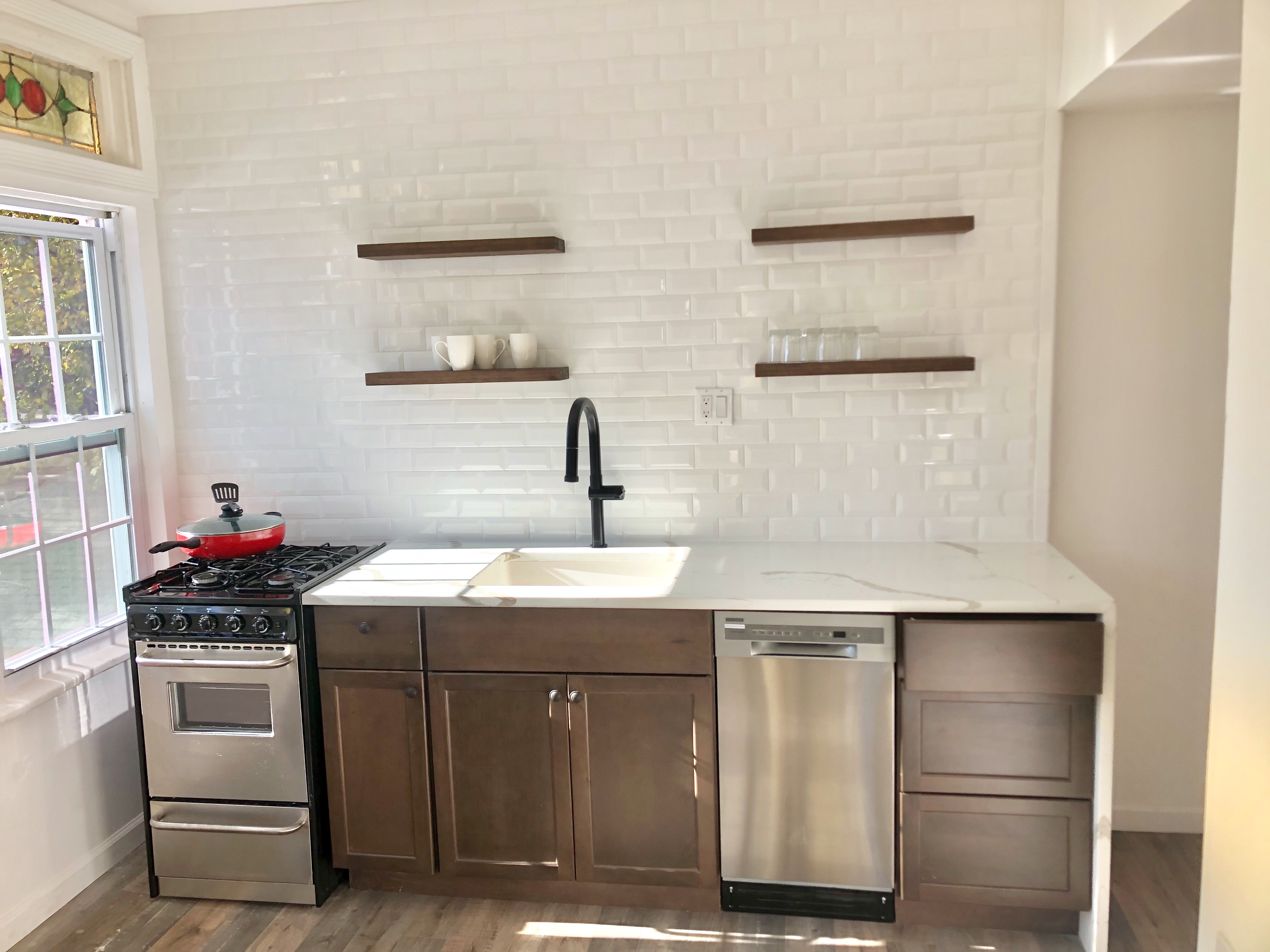 1112 Beverley Road Brooklyn, NY 11218 - Photo 40 of 53 a kitchen with a sink and cabinets