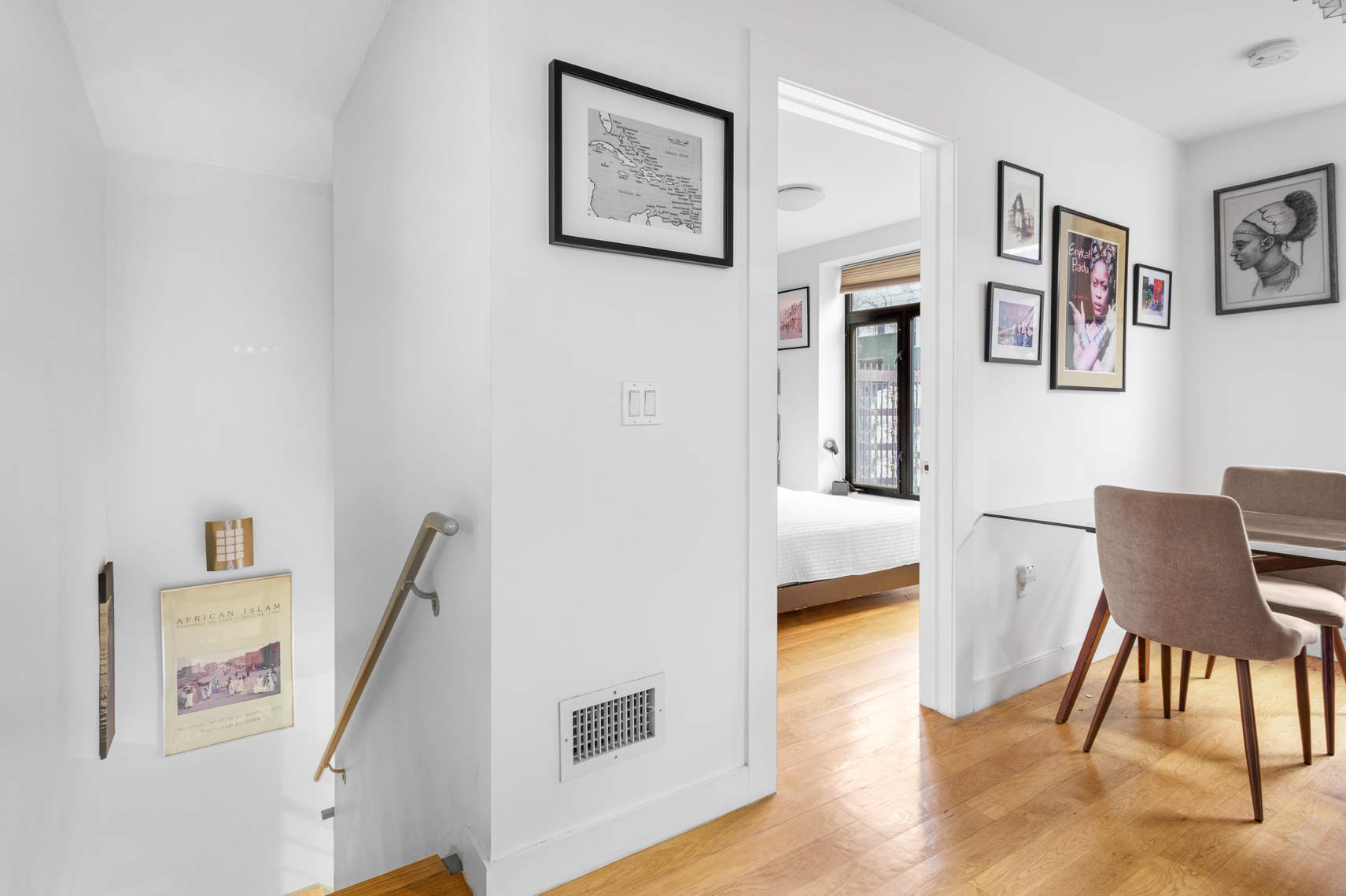730 Lafayette Avenue, Unit 1F Brooklyn, NY 11221 - Photo 7 of 13 a living room with furniture and a wooden floor