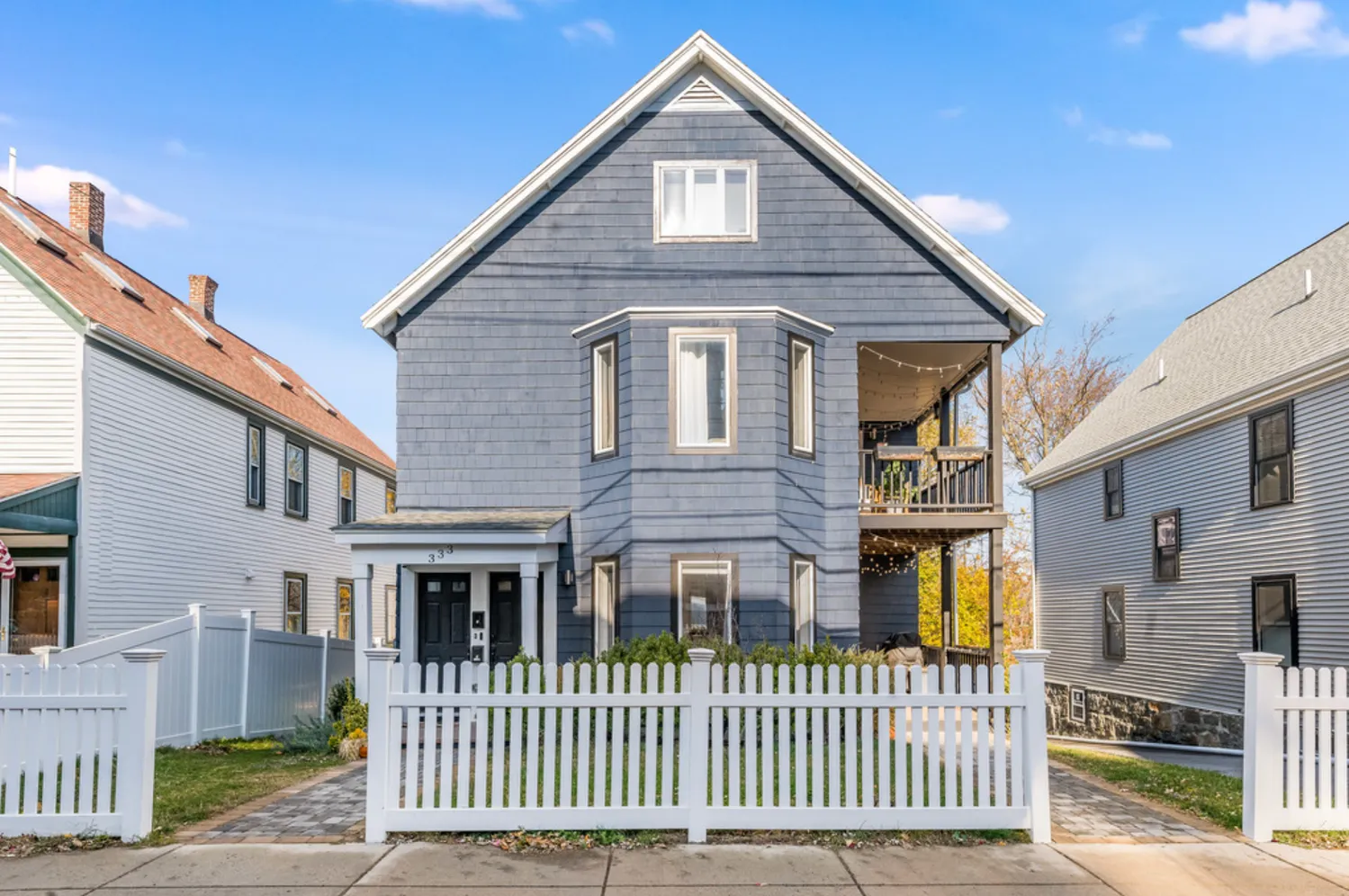 a front view of a house with a porch