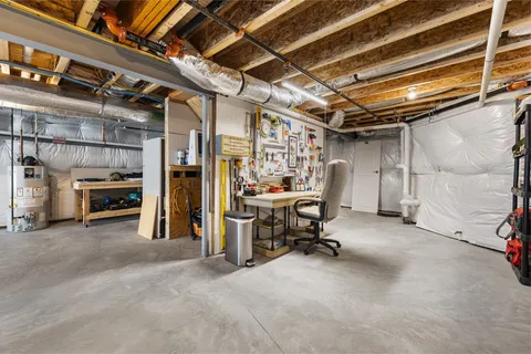 a view of roof deck with patio