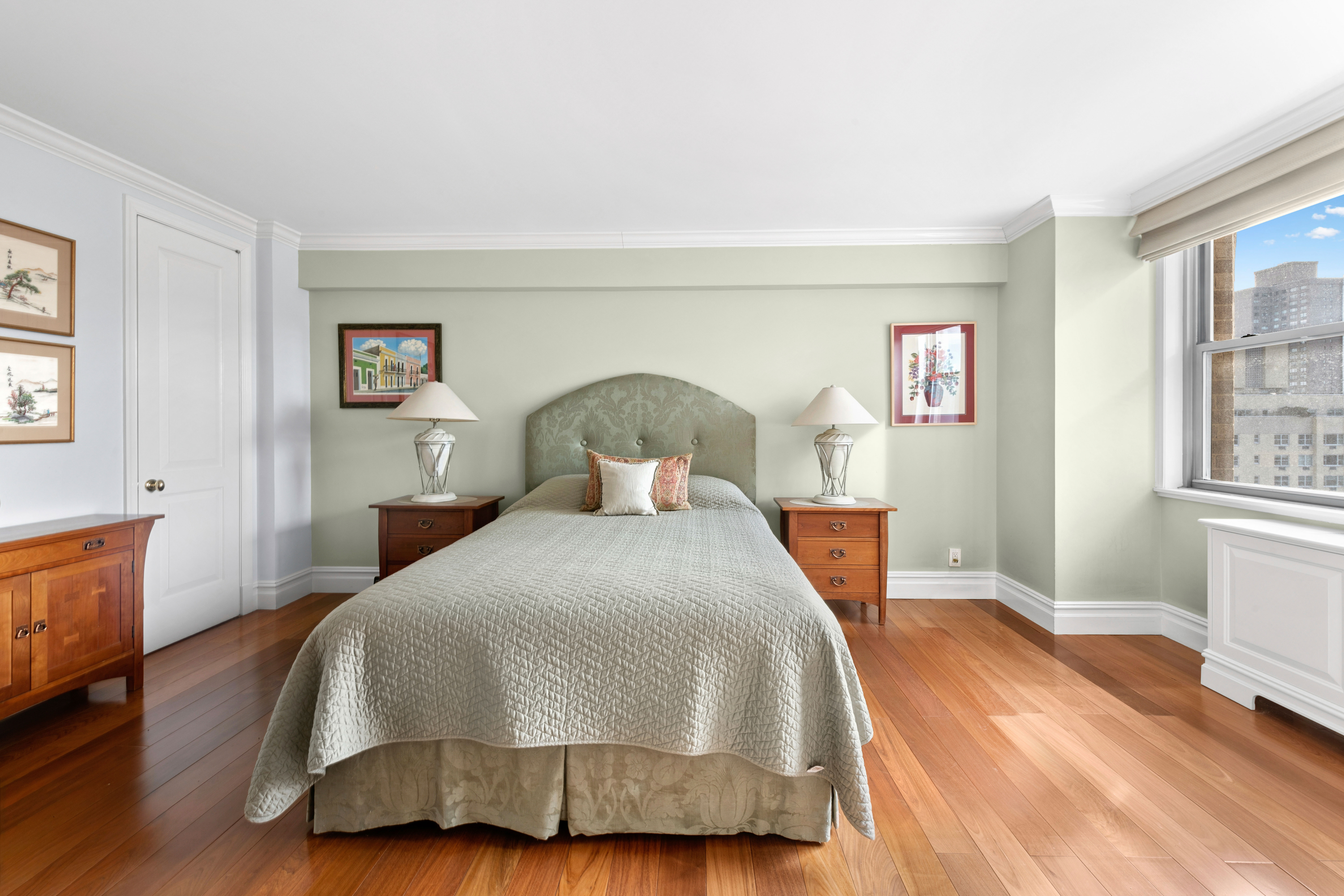 444 East 86th Street, Unit 25EF Manhattan, NY 10028 - Photo 6 of 18 a bedroom with a bed and wooden floor