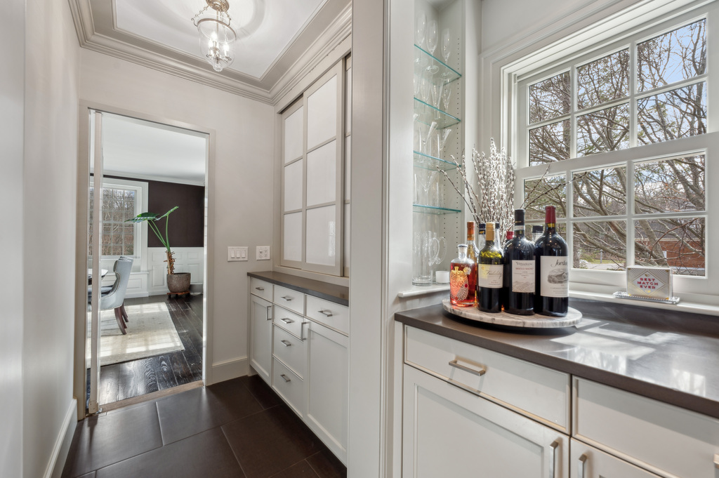 79 Pine Street Dover, MA 02030 - Photo 9 of 25 a kitchen with a refrigerator and a sink