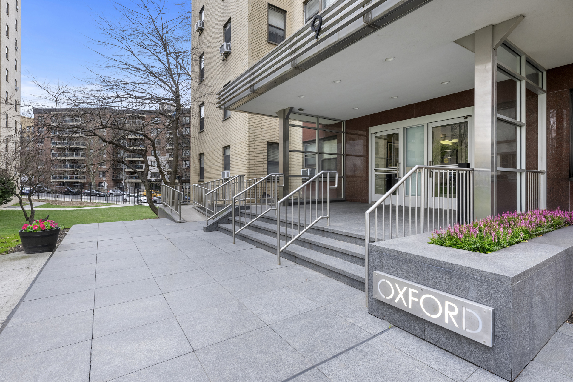 9 Fordham Hill Ovl, Unit 7H Bronx, NY 10468 - Photo 9 of 10 front view of a house with a patio