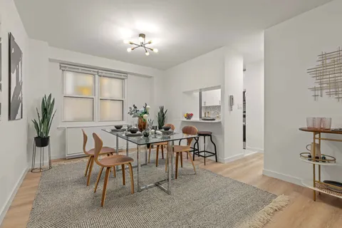 a view of a balcony with chairs