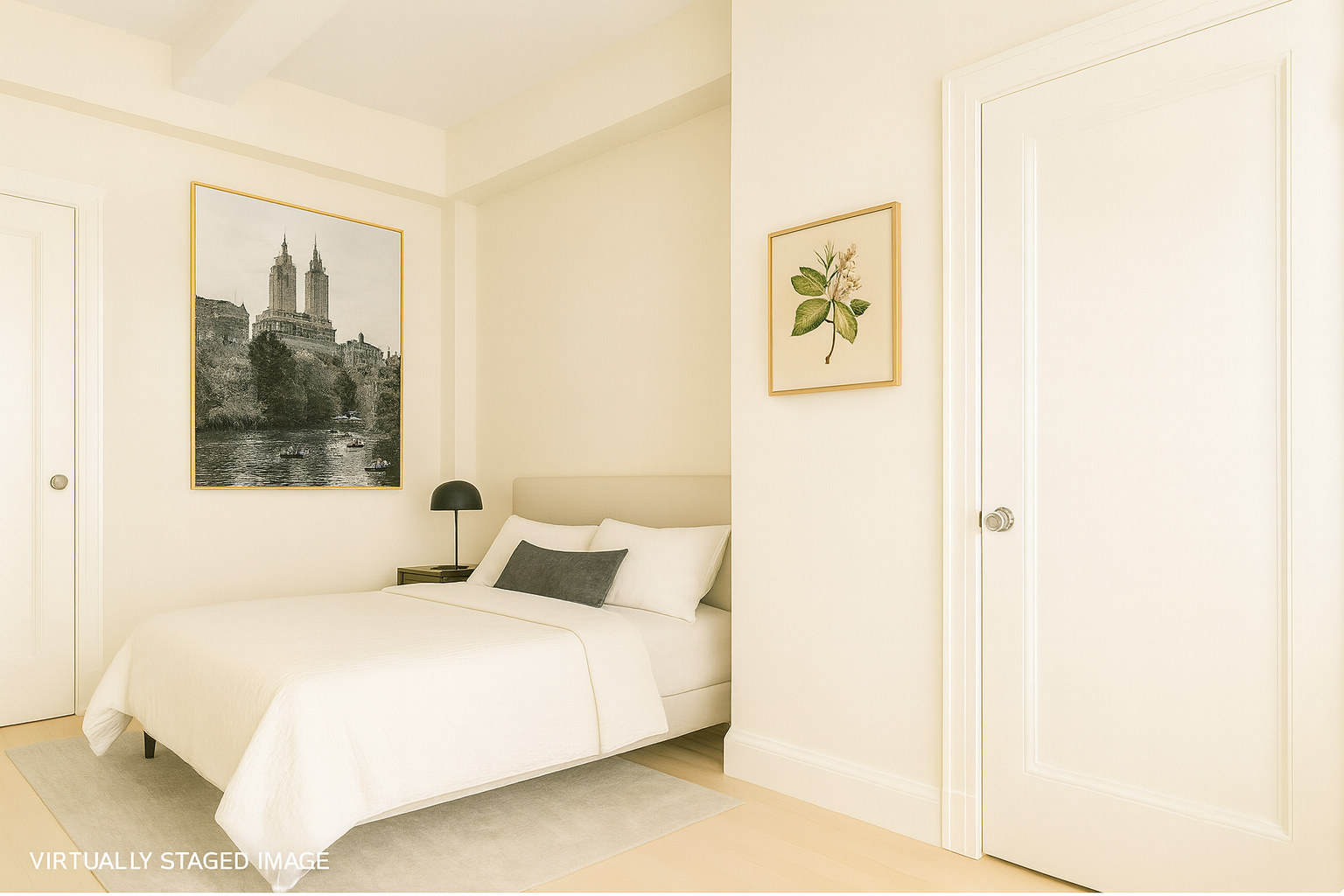 2 West 67th Street, Unit 14/15E Manhattan, NY 10023 - Photo 3 of 10 a bedroom with a bed and a painting on the wall