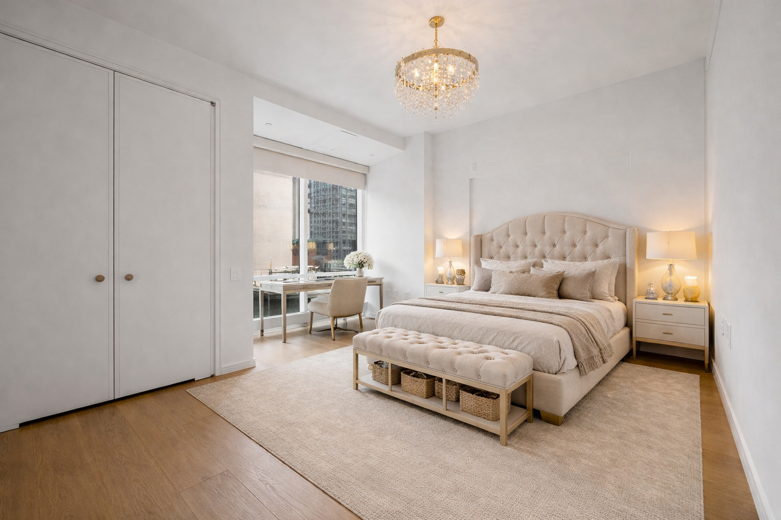 5 Beekman Street, Unit 30A Manhattan, NY 10038 - Photo 3 of 15 a spacious bedroom with a bed and a chandelier