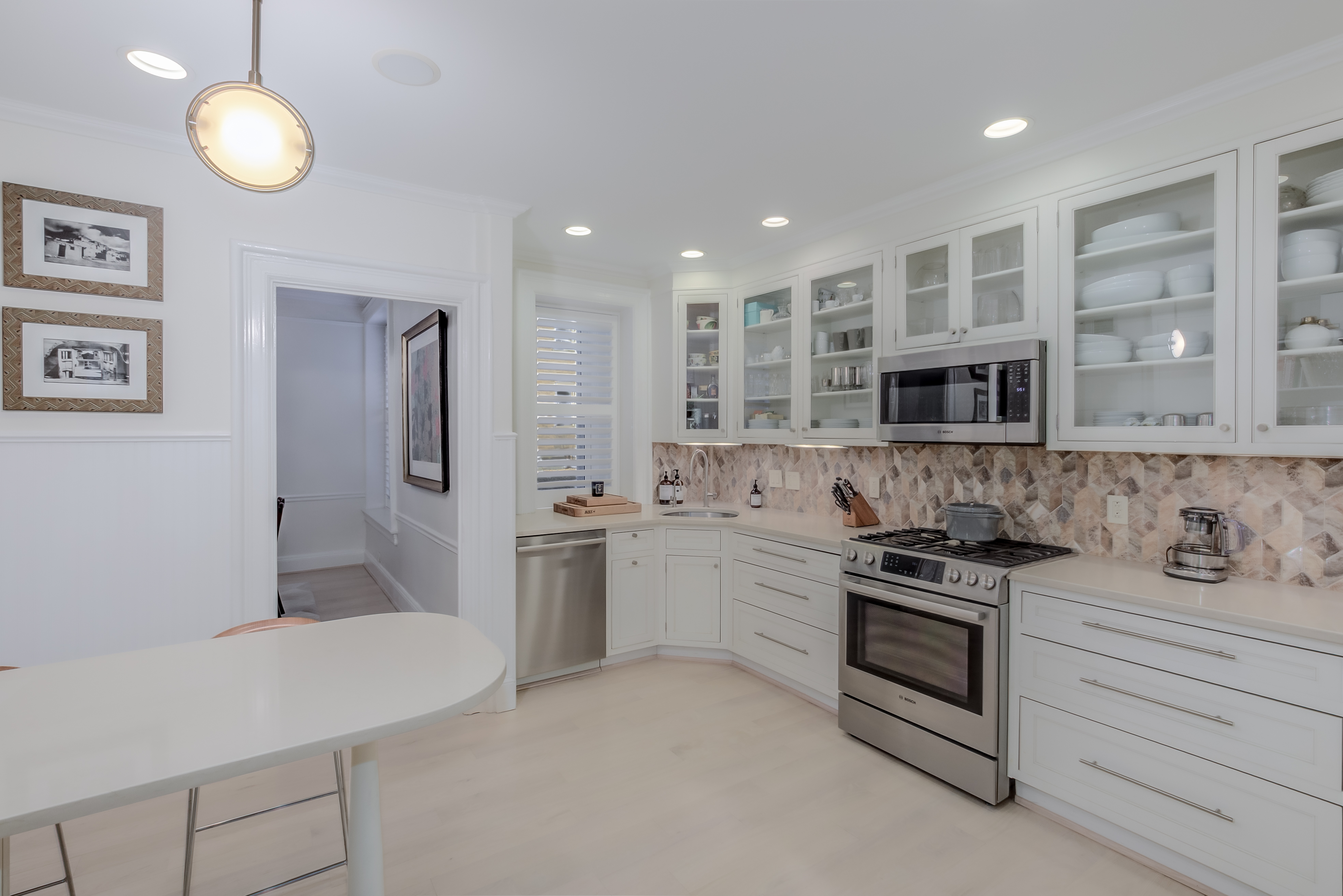 2022 Columbia Road Northwest, Unit 202 Washington, DC 20009 - Photo 9 of 15 a kitchen with stainless steel appliances granite countertop a sink and a stove
