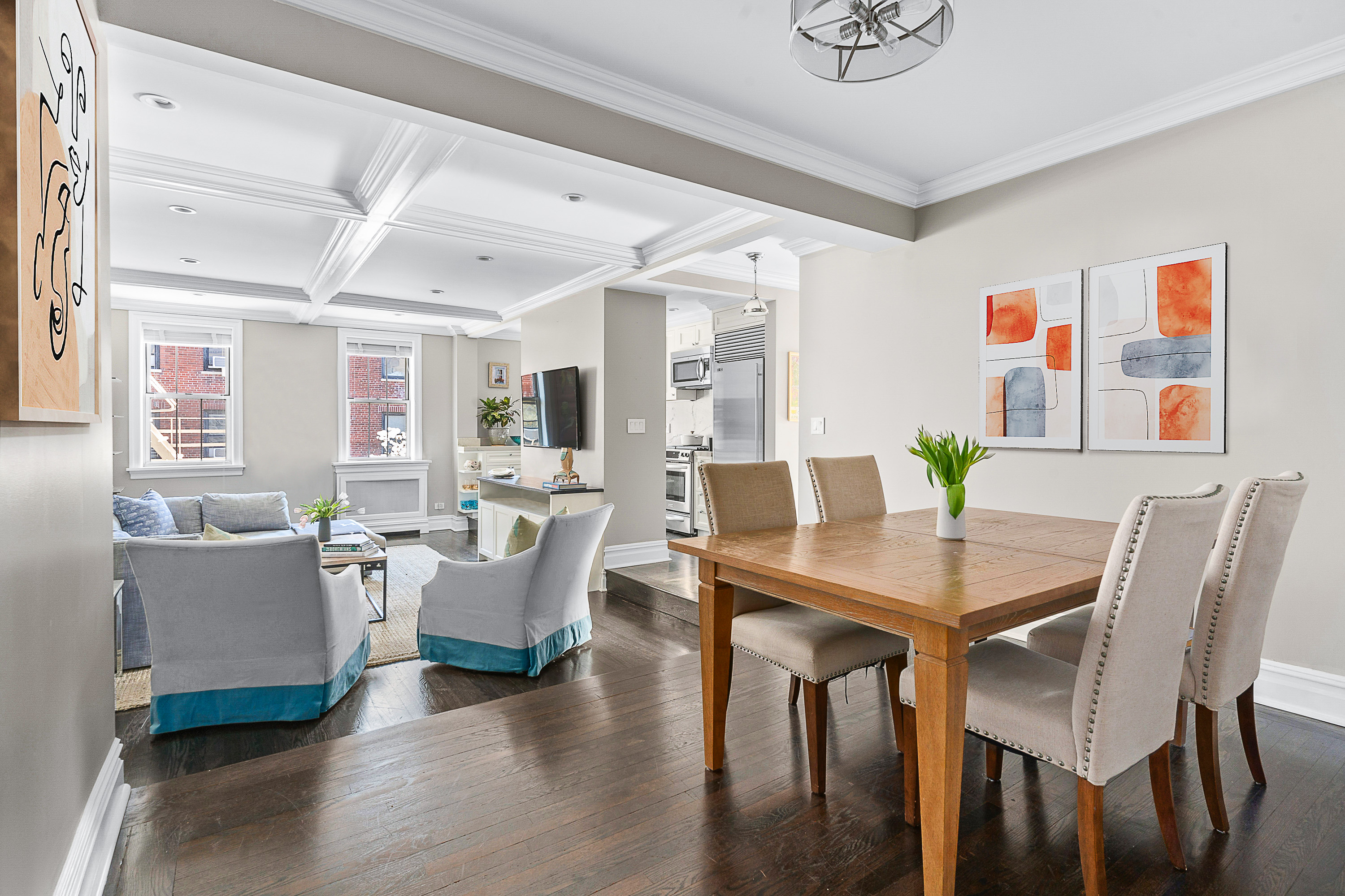 75 Bank Street, Unit 3K Manhattan, NY 10014 - Photo 2 of 11 a view of a dining room with furniture and wooden floor