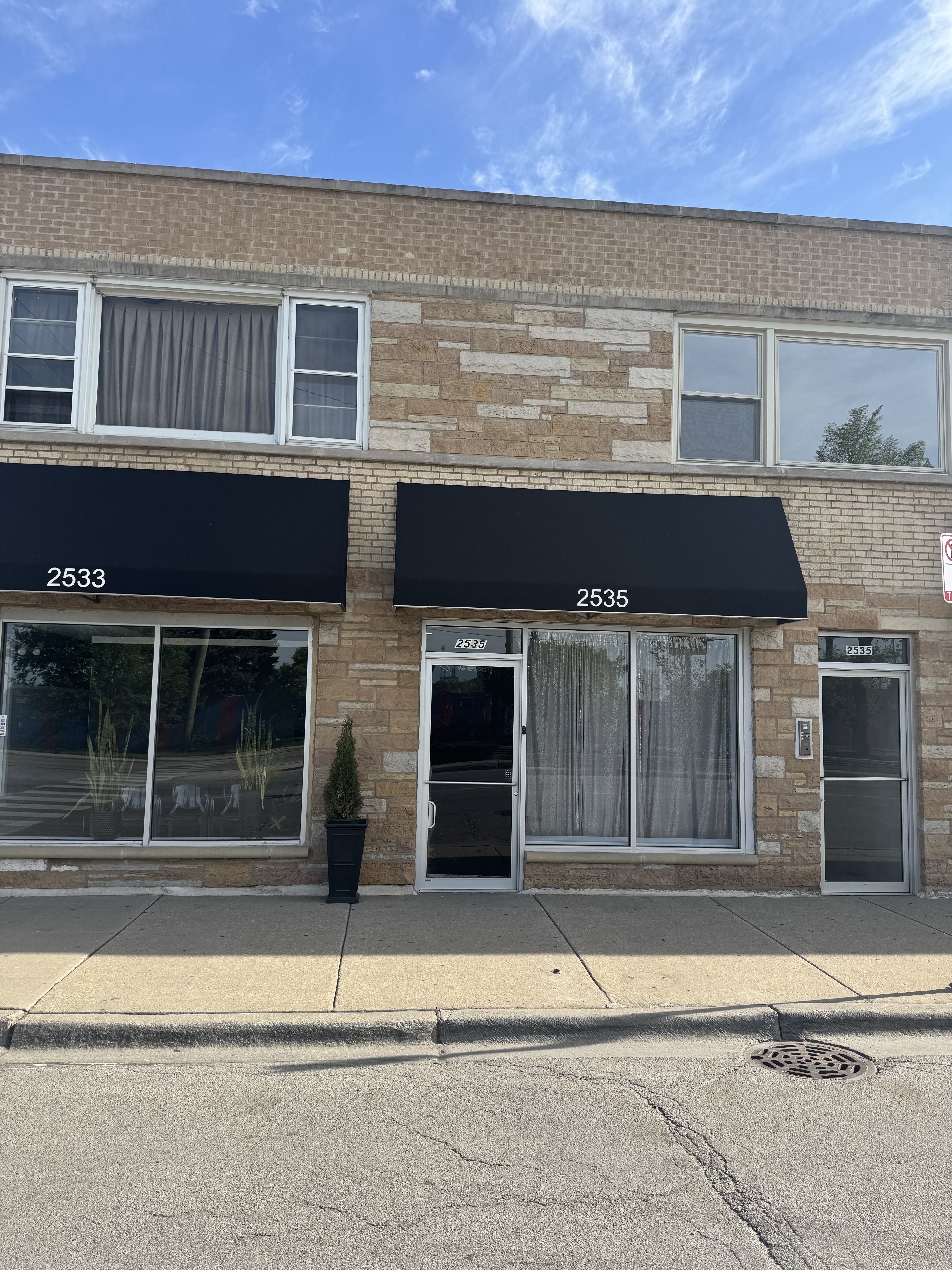 a front view of a house with a space