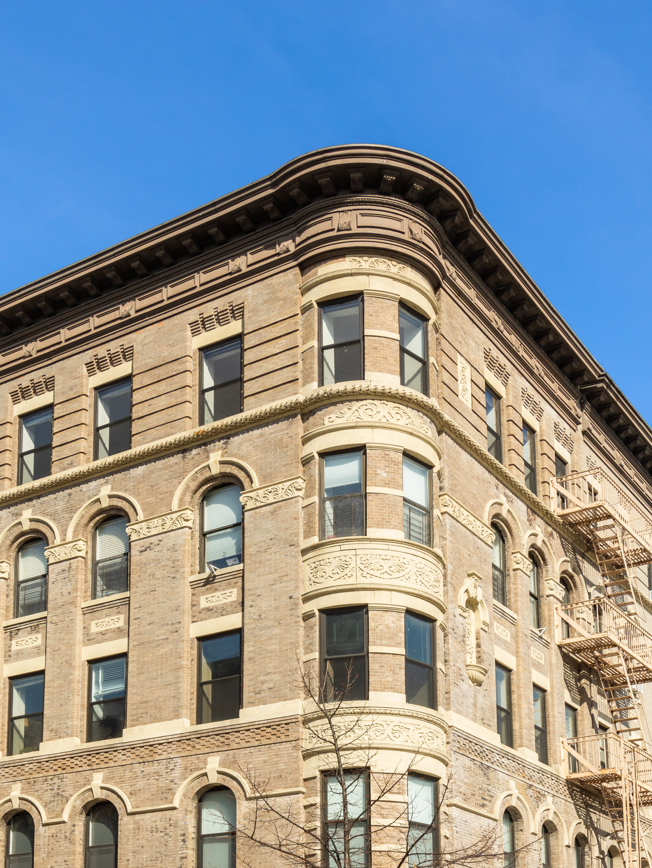 61 Lenox Avenue, Unit 5D Manhattan, NY 10026 - Photo 13 of 14 a front view of a building