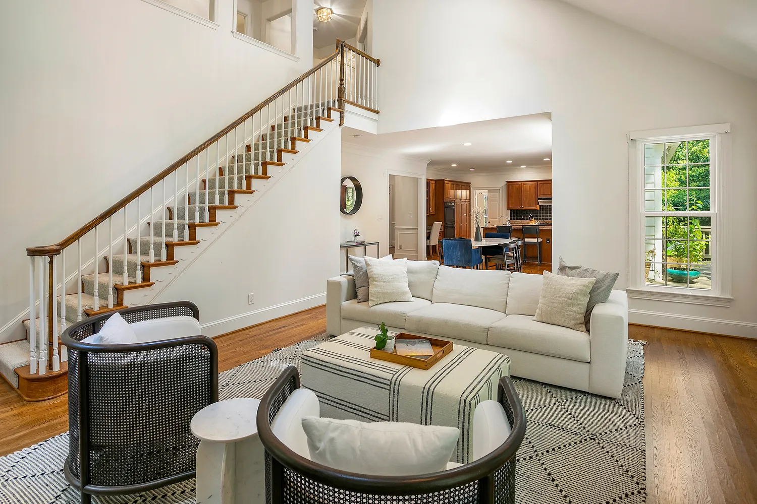 a living room with furniture and a table