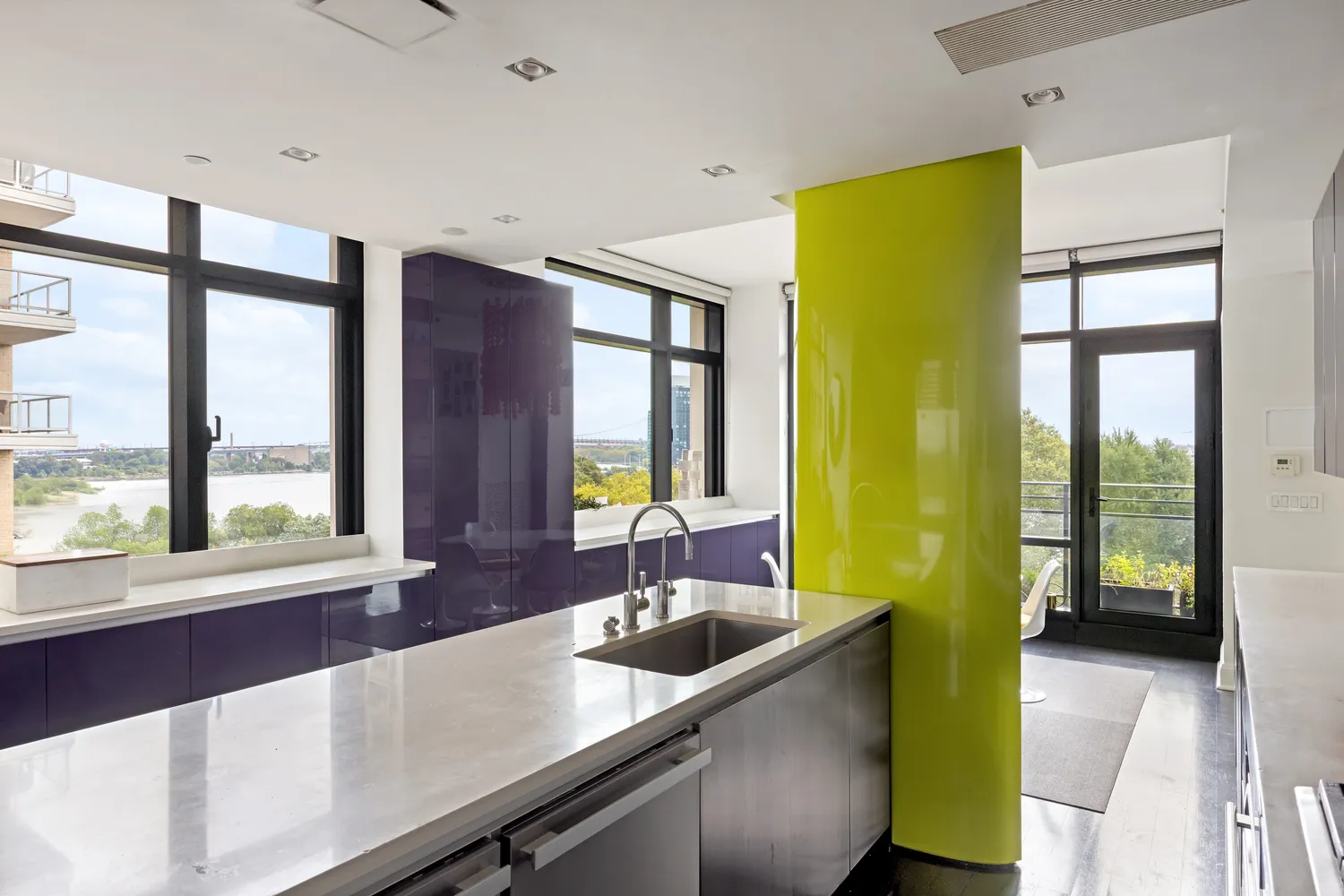 a view of a bathroom with a tub and a sink