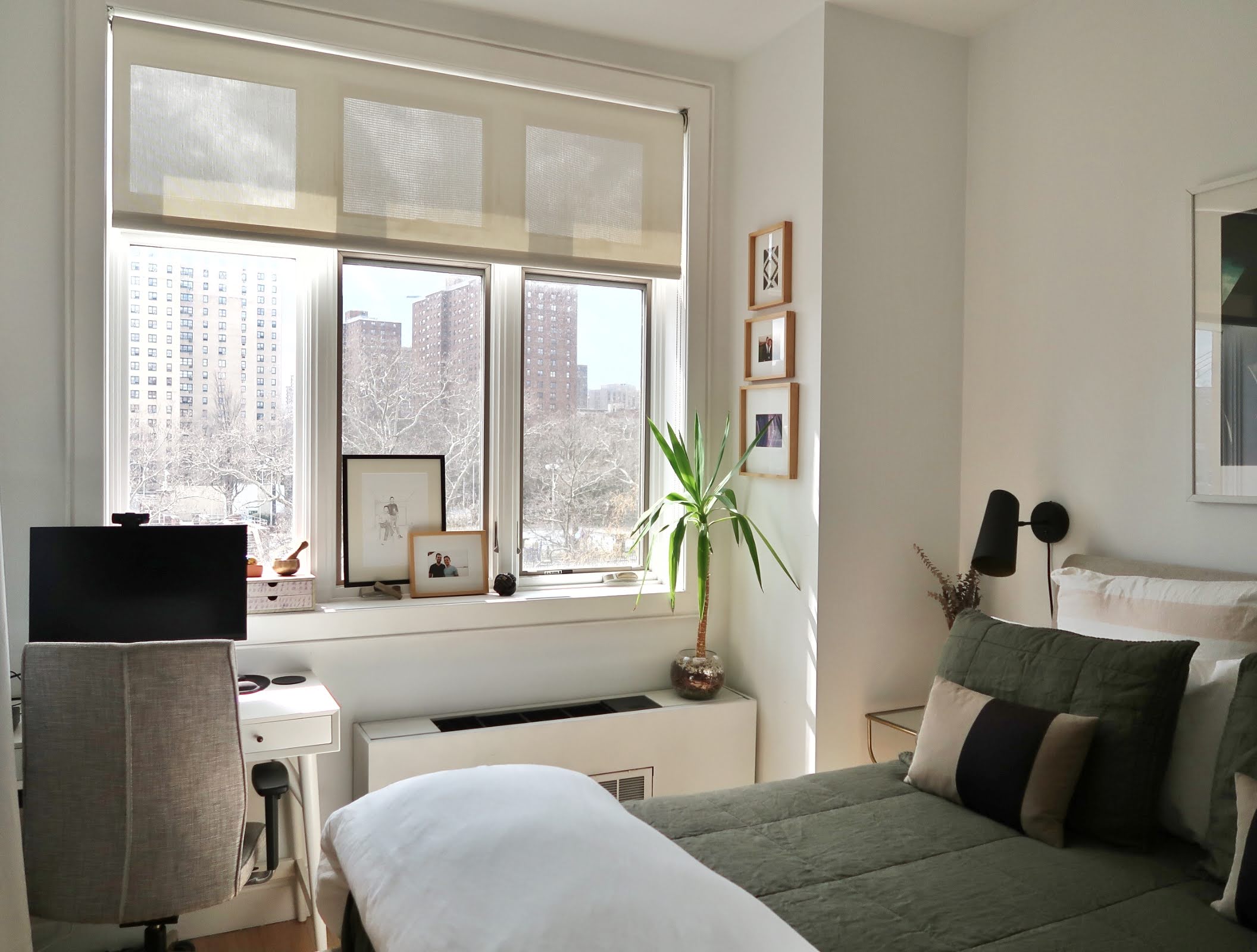 296 East 2nd Street, Unit 4G Manhattan, NY 10009 - Photo 11 of 14 a living room with furniture and a floor to ceiling window