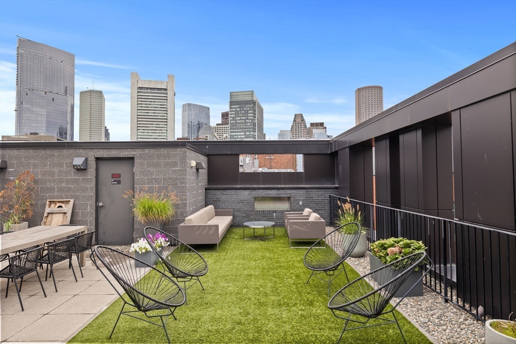 10 Farnsworth Street, Unit 3A Boston, MA 02210 - Photo 28 of 31 a view of a chairs and table in patio