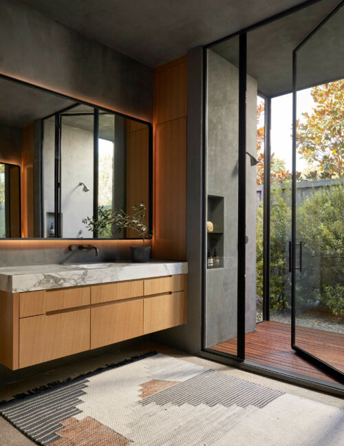 5716 Stonegate Road Dallas, TX 75209 - Photo 14 of 25 a spacious bathroom with a large mirror