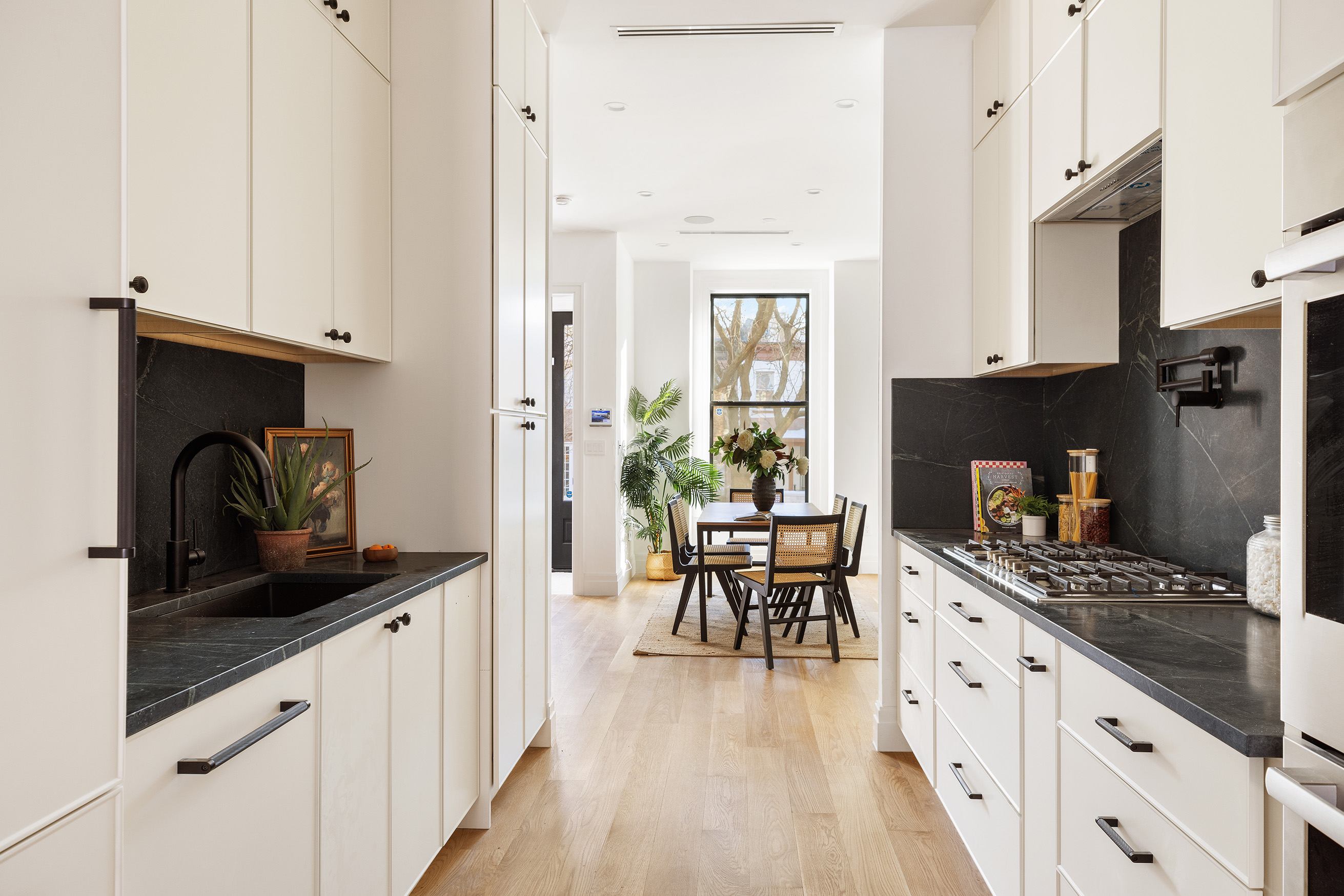347 A Quincy Street Brooklyn, NY 11216 - Photo 3 of 15 a kitchen with stainless steel appliances kitchen island granite countertop a sink and cabinets