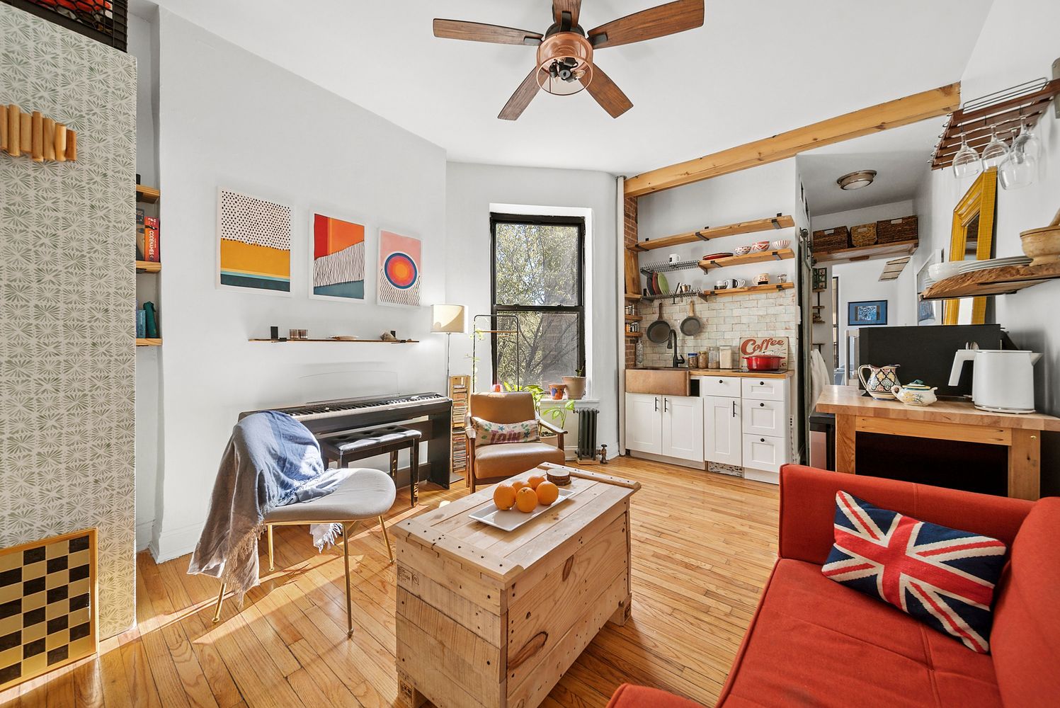 a living room with furniture and a window