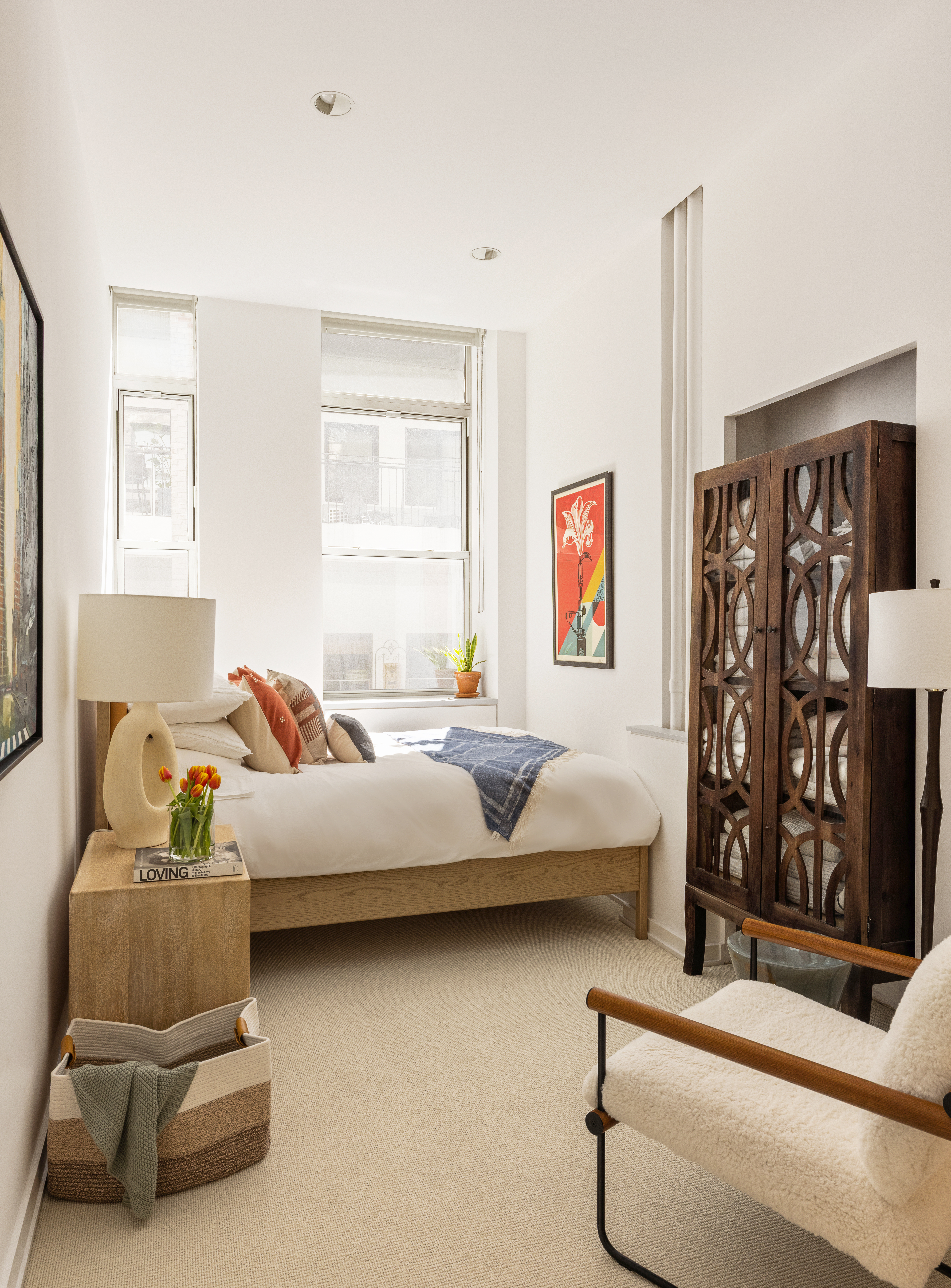56 East 11th Street, Unit 5 Manhattan, NY 10003 - Photo 9 of 18 a bedroom with furniture and window