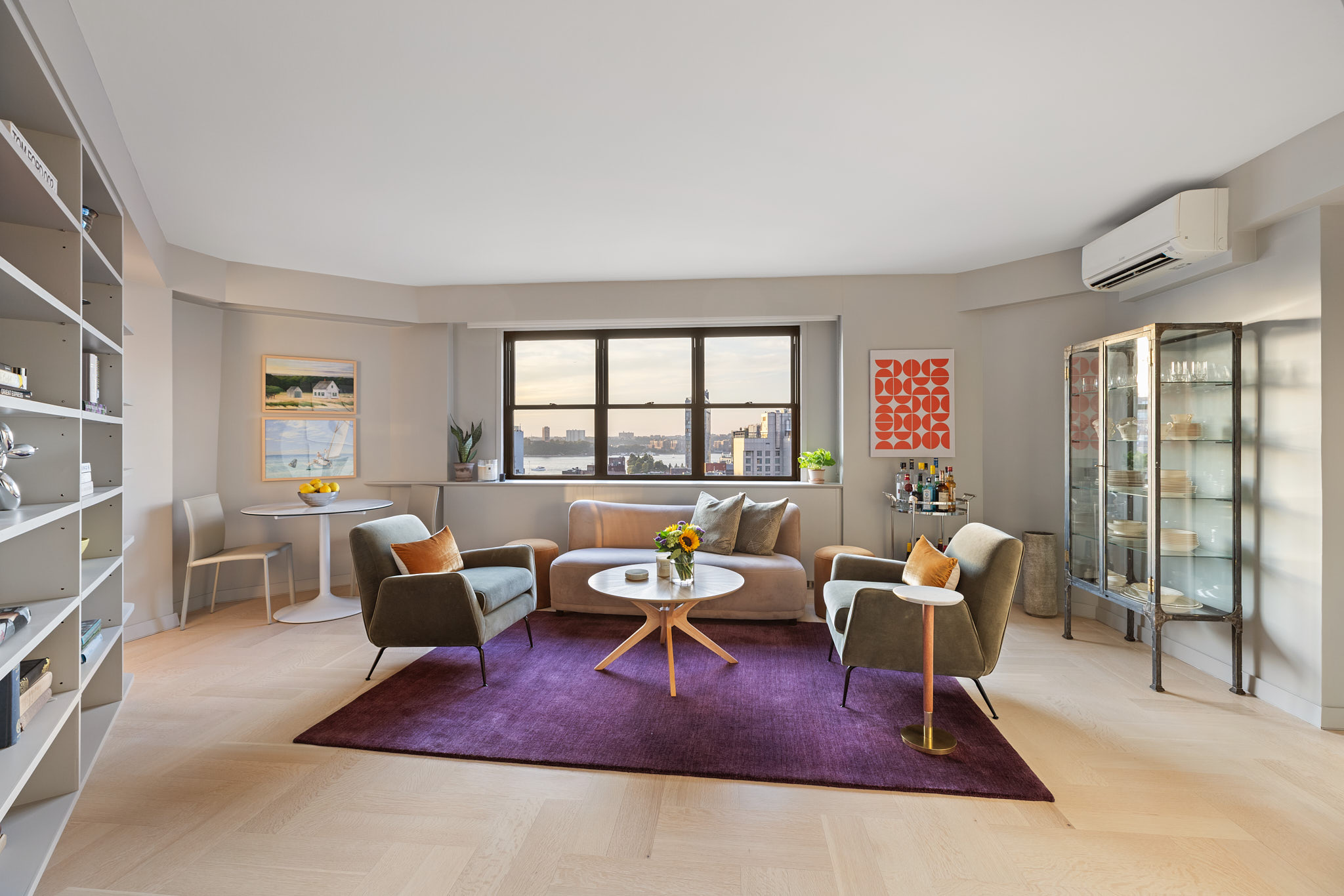 31 Jane Street, Unit 16A Manhattan, NY 10014 - Photo 2 of 17 a living room with furniture rug and window