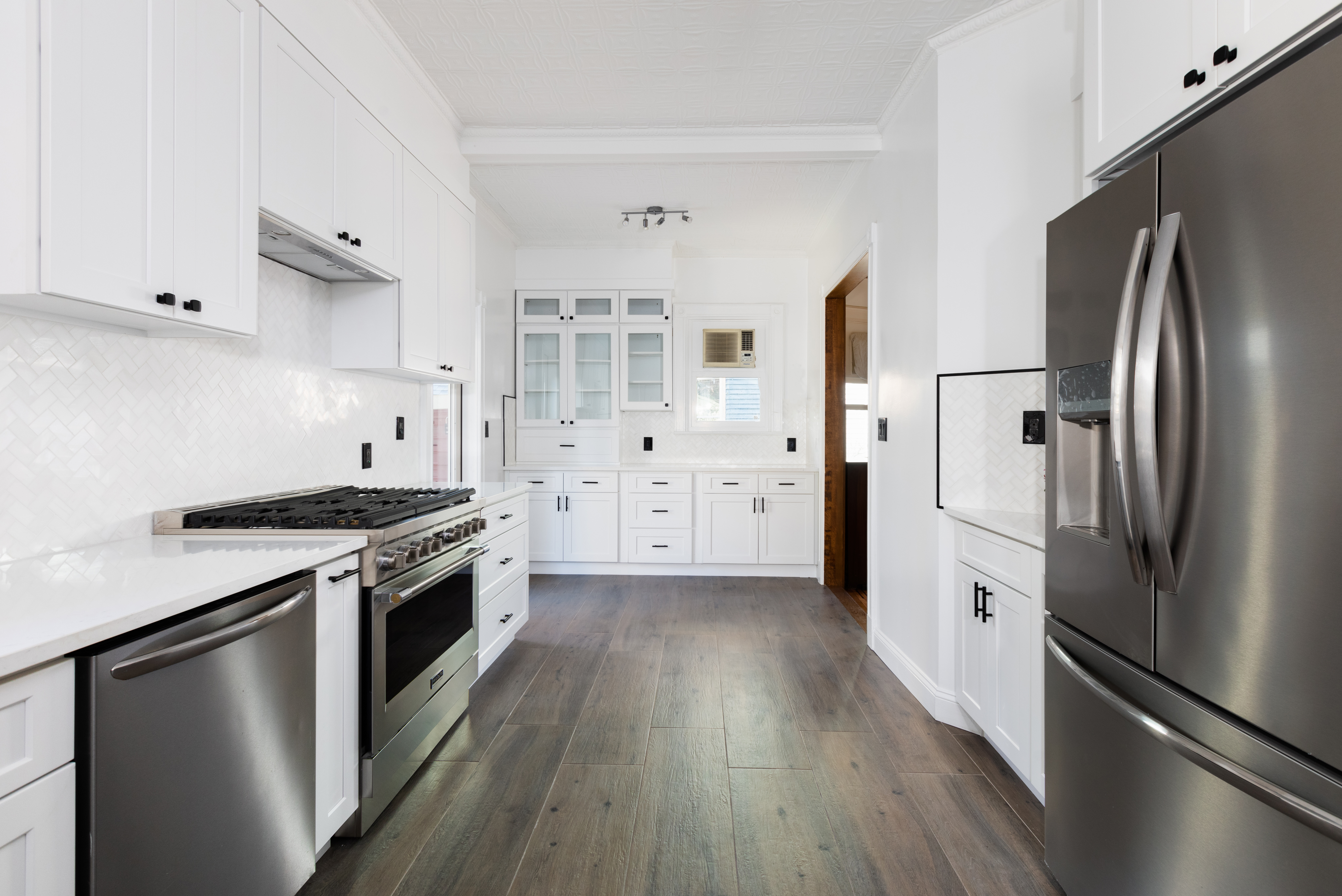 196 Marlborough Road Brooklyn, NY 11226 - Photo 12 of 23 a kitchen with stainless steel appliances a stove a refrigerator and a refrigerator