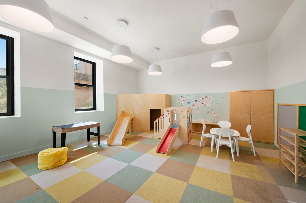 122 West Street, Unit PHA Brooklyn, NY 11222 - Photo 11 of 14 a very nice looking room with a dining table and a large window