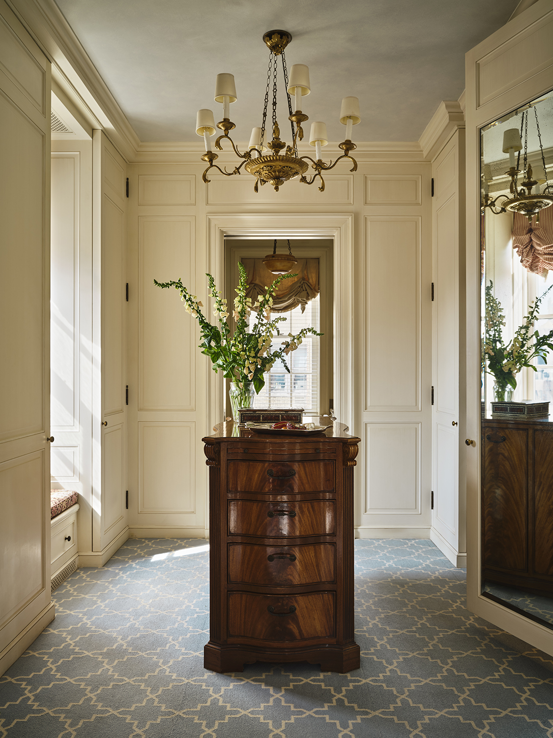 620 Park Avenue, Unit 14 Manhattan, NY 10065 - Photo 26 of 32 a view of a hallway with windows and flower pot