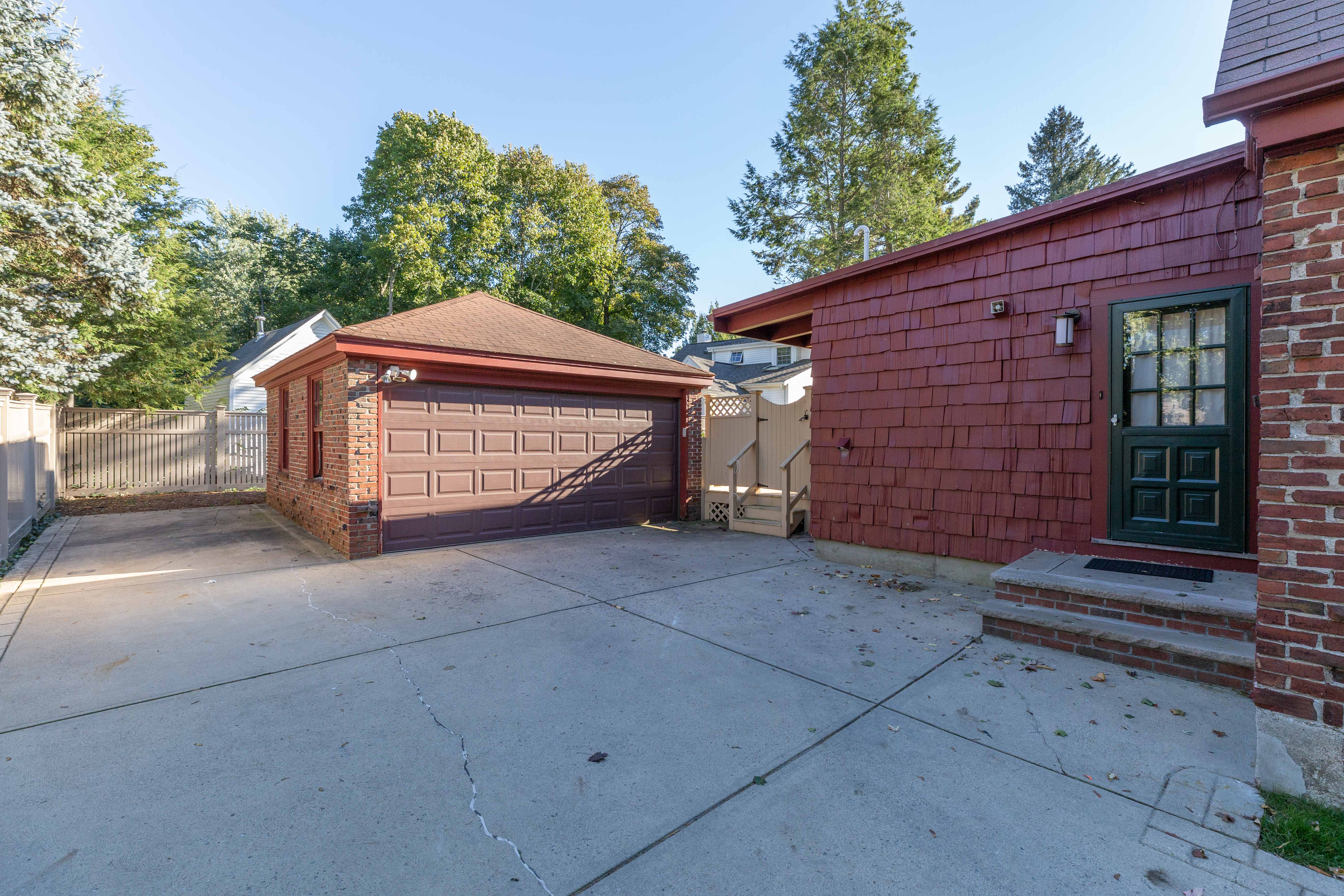 290 Dorset Road Waban, MA 02468 - Photo 19 of 23 a front view of a house with a garage