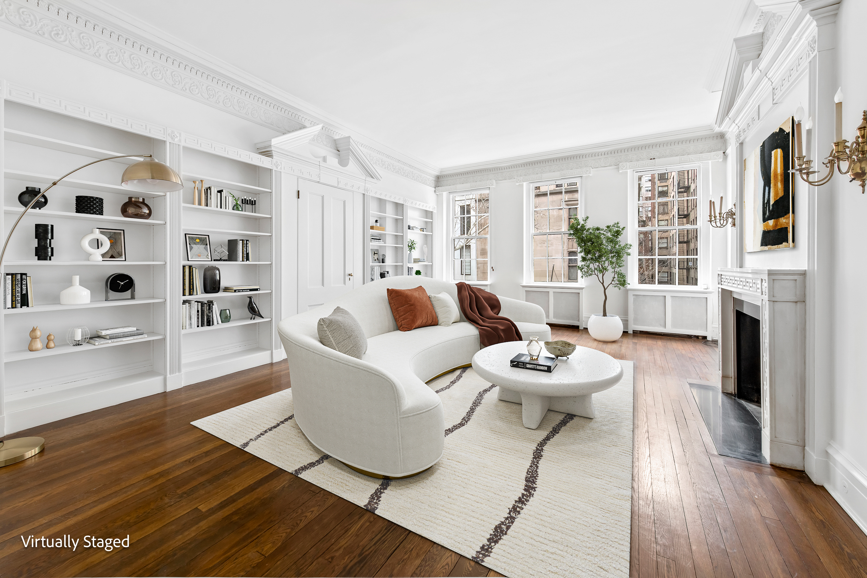 155 East 70th Street Manhattan, NY 10021 - Photo 10 of 27 a living room with furniture and a fireplace