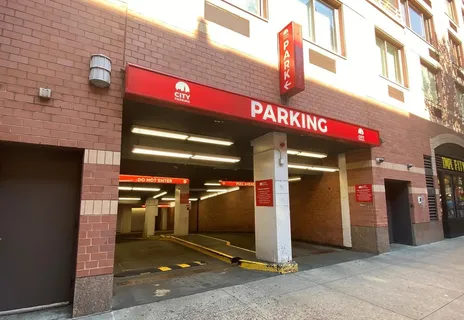 a view of a building with retail shops
