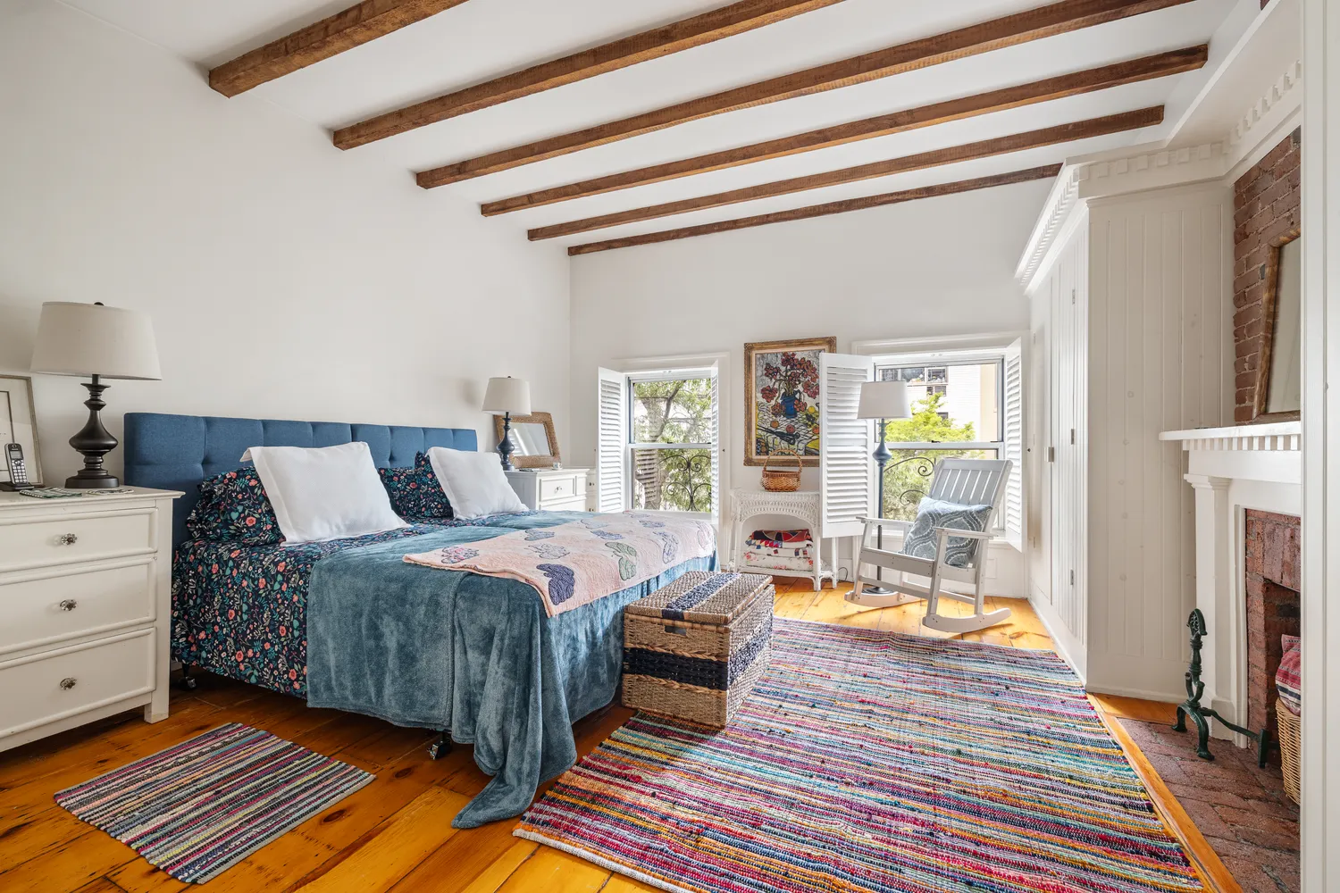 a bed room with a bed and a window