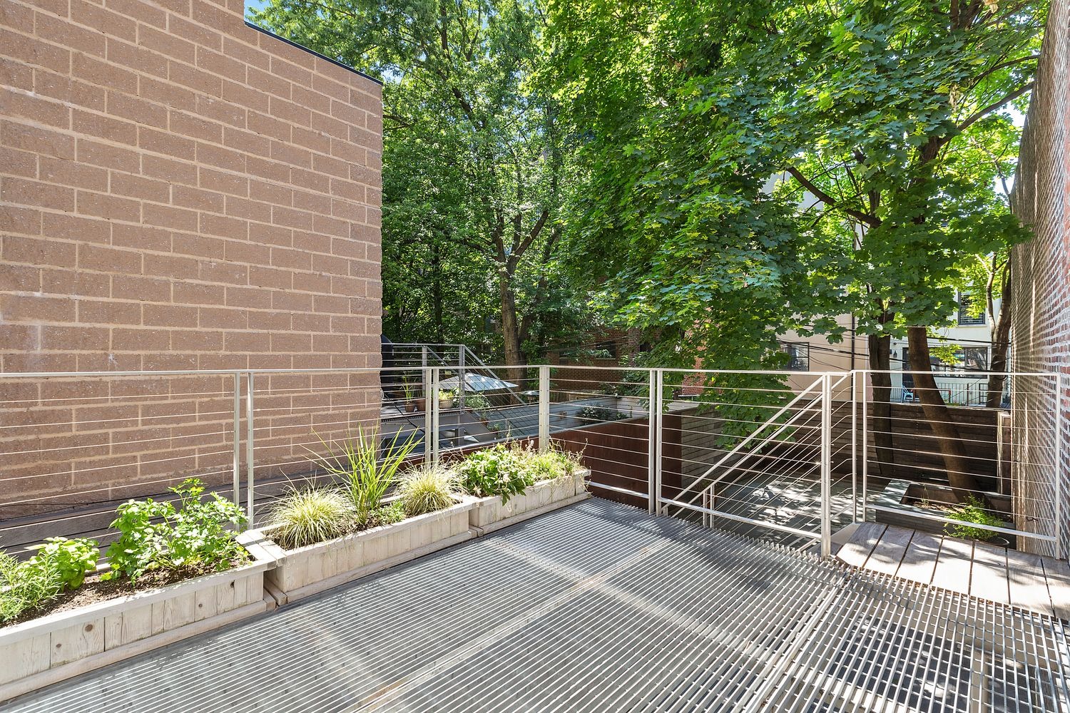 64 Clifton Place, Unit PARLOR Brooklyn, NY 11238 - Photo 7 of 17 a view of a chair and table in the back yard of the house