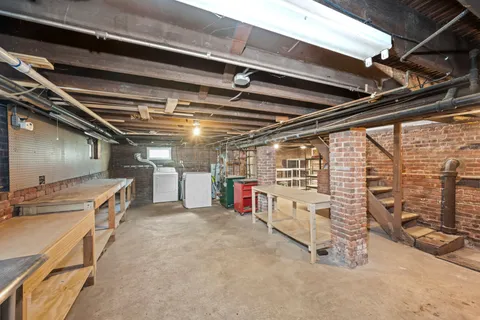 a view of a lake with a house in the background