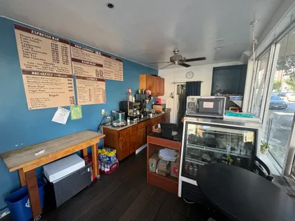 a living room with furniture fireplace and flat screen tv