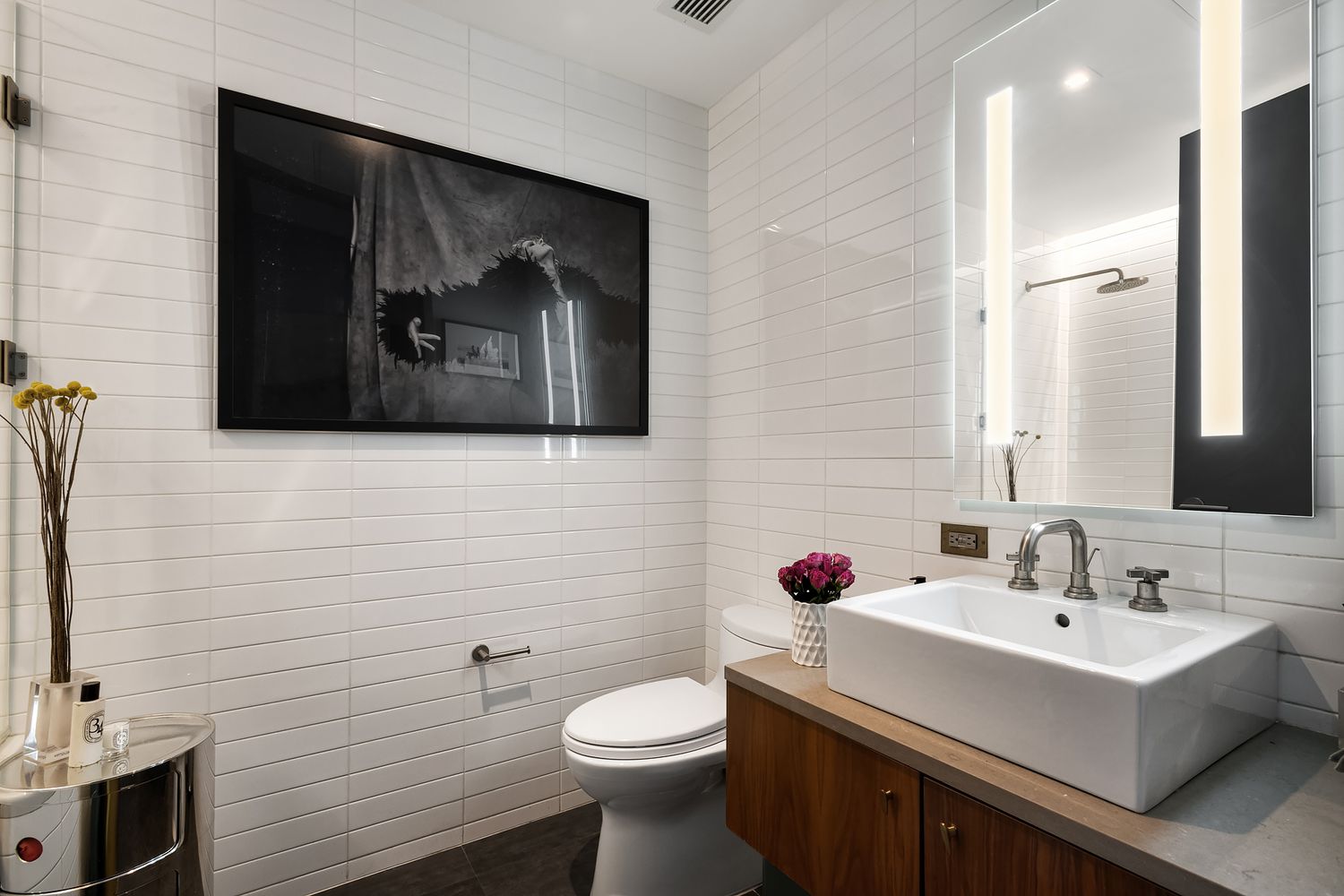 280 Metropolitan Avenue, Unit 5D Brooklyn, NY 11211 - Photo 15 of 22 a bathroom with a sink toilet and mirror