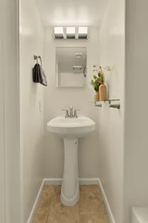 a view of an empty room with a fireplace