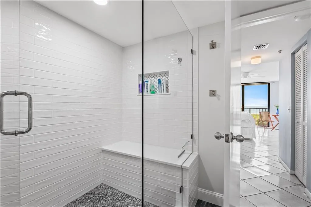 a bedroom with bed and a window