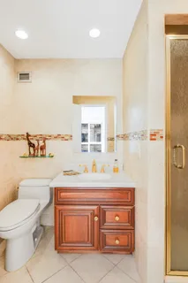 a bathroom with a sink a toilet and a bathtub