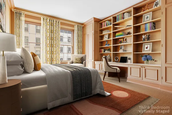 a bedroom with a bed a dresser and a large window