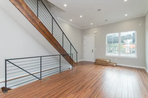 a view of entryway with wooden floor