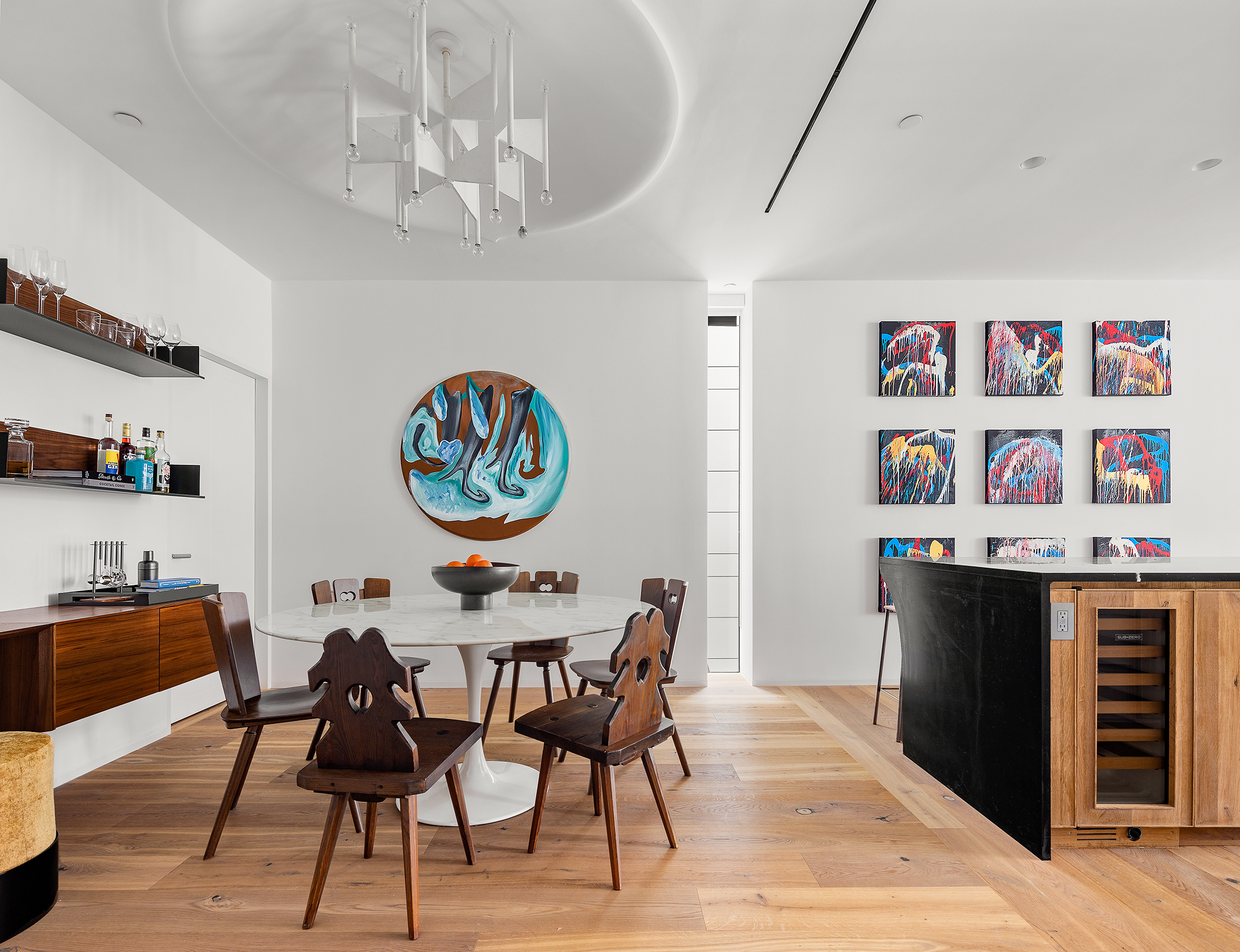 325 West Broadway, Unit 4B Manhattan, NY 10013 - Photo 6 of 17 a dining room with furniture and a chandelier
