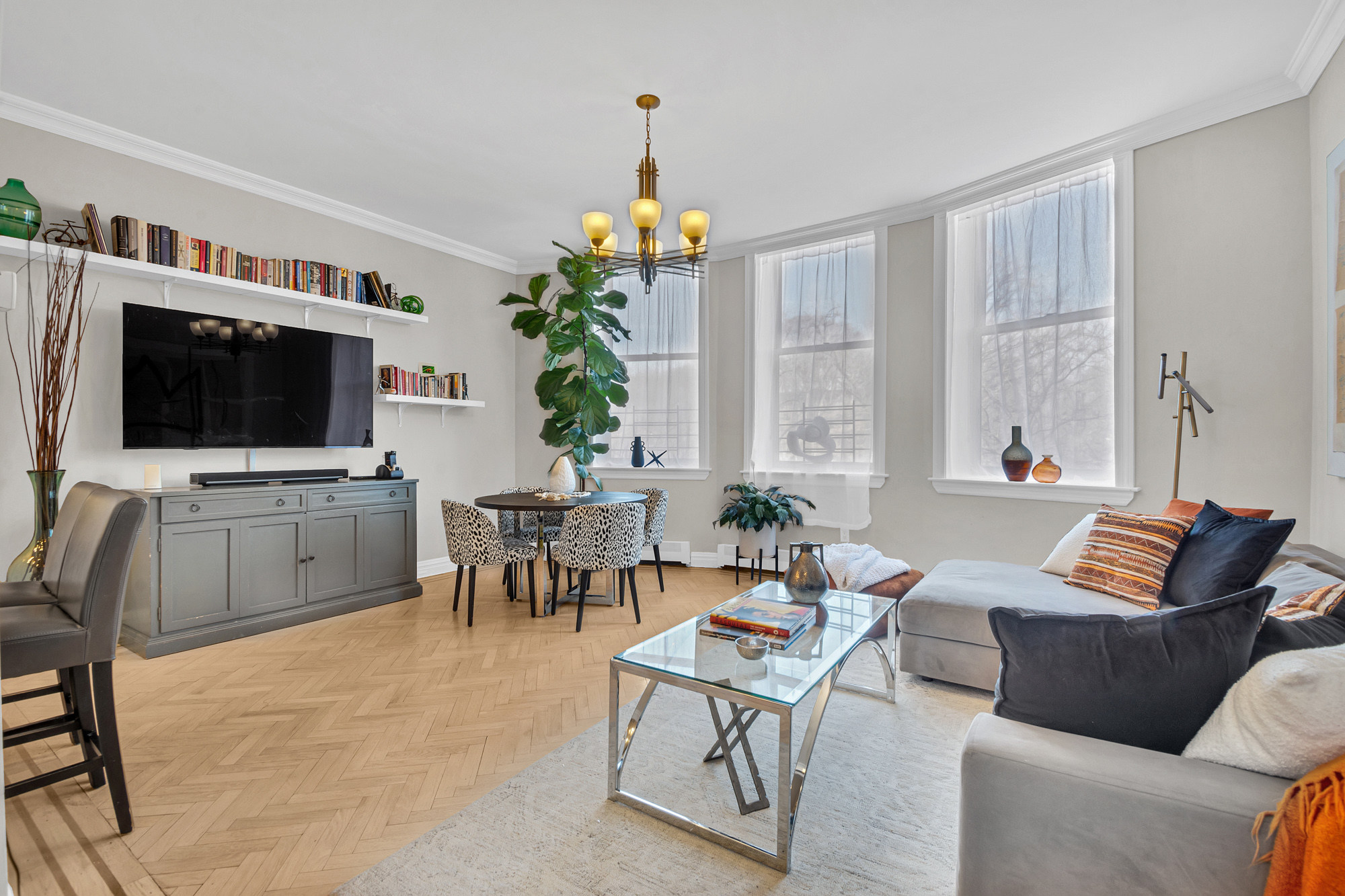 8 Mt Morris Park West, Unit C Manhattan, NY 10027 - Photo 3 of 12 a living room with furniture and a flat screen tv
