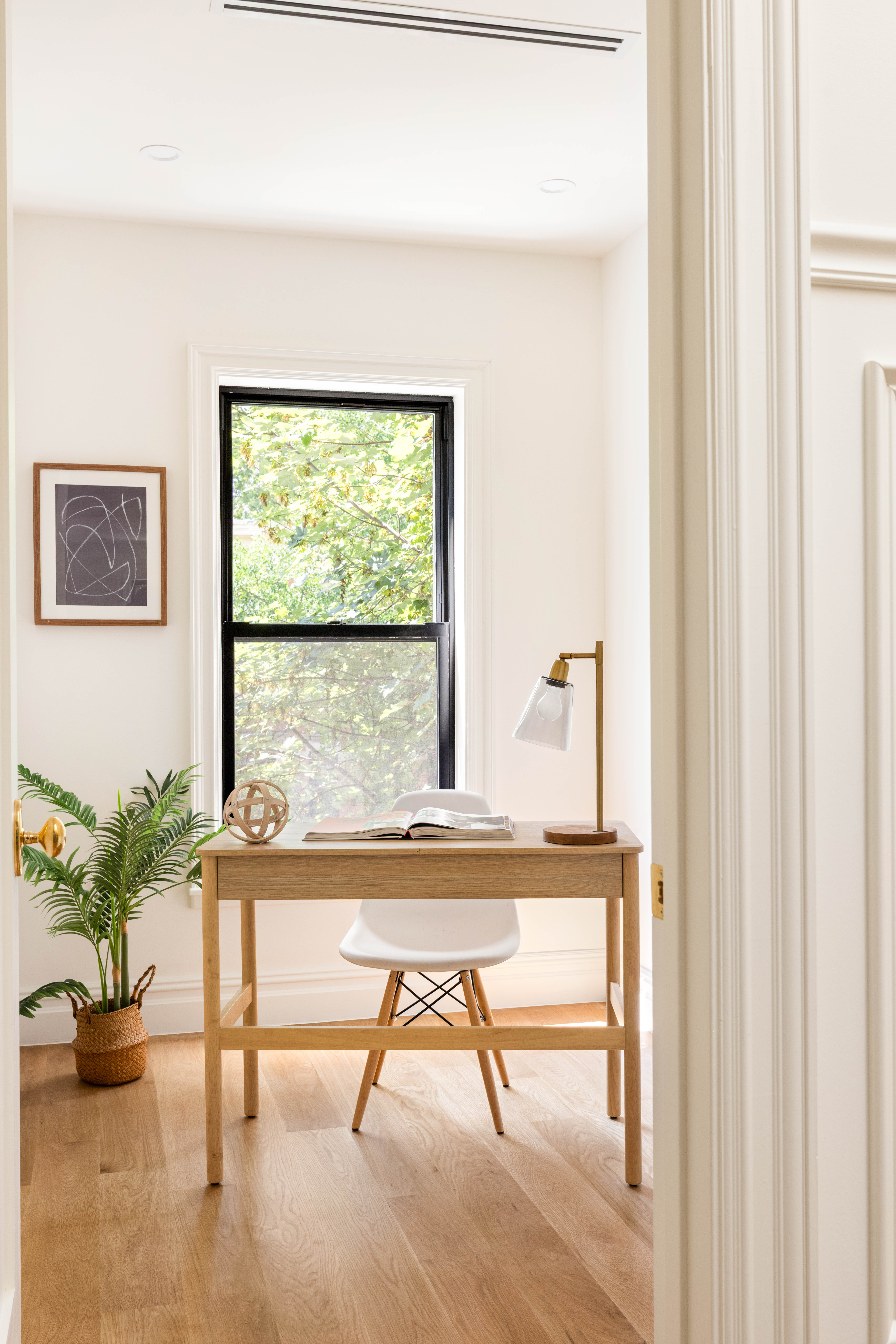 287 Midwood Street Brooklyn, NY 11225 - Photo 12 of 17 a living room with furniture and a window