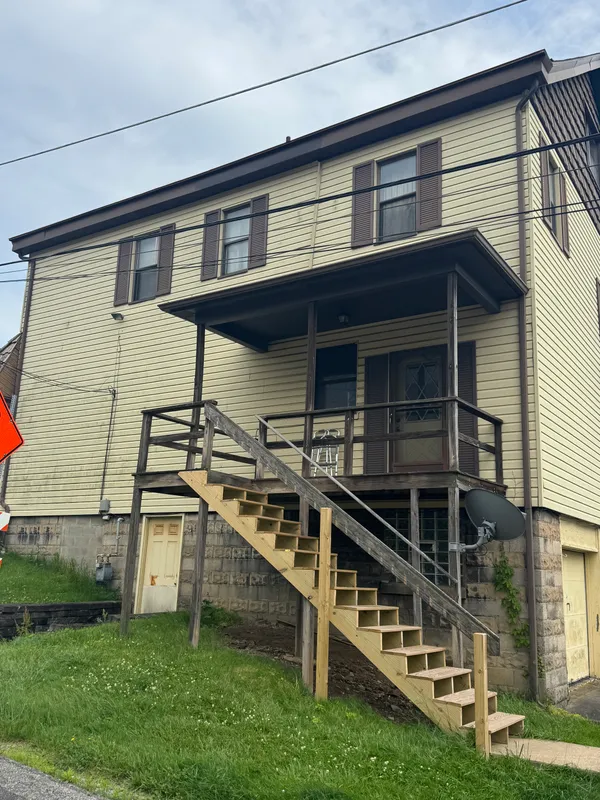 a view of a house with a large window