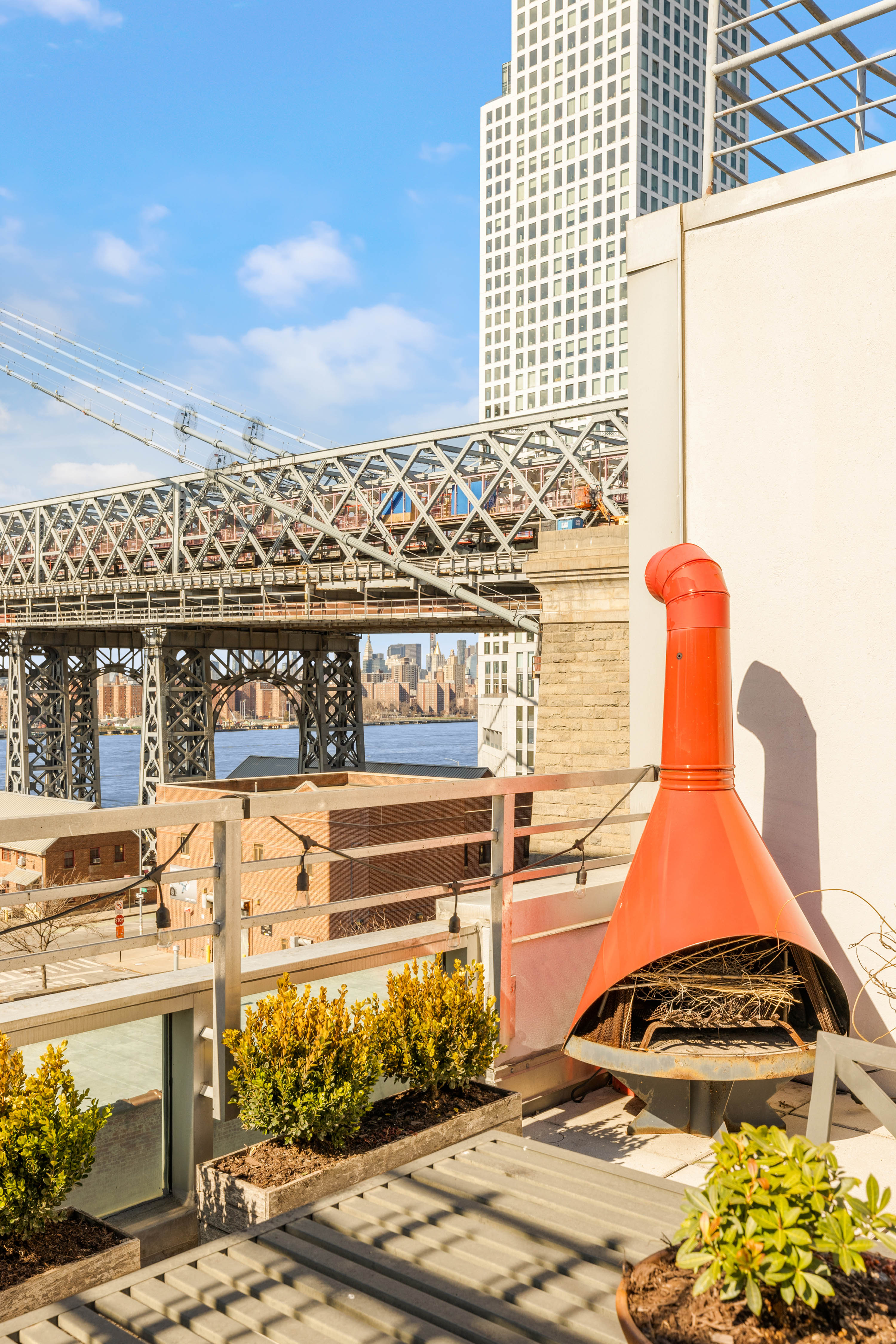 24 Dunham Place, Unit PHA Brooklyn, NY 11249 - Photo 16 of 19 a picture of a table and chairs