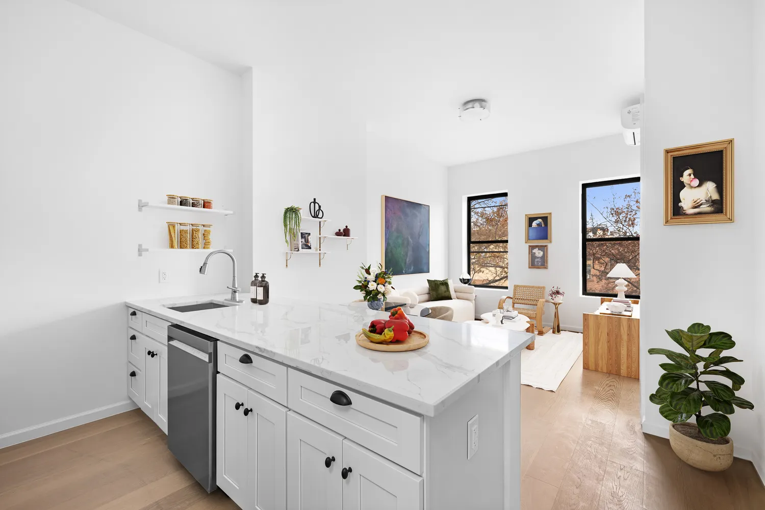 a view of bathroom sink and a mirror