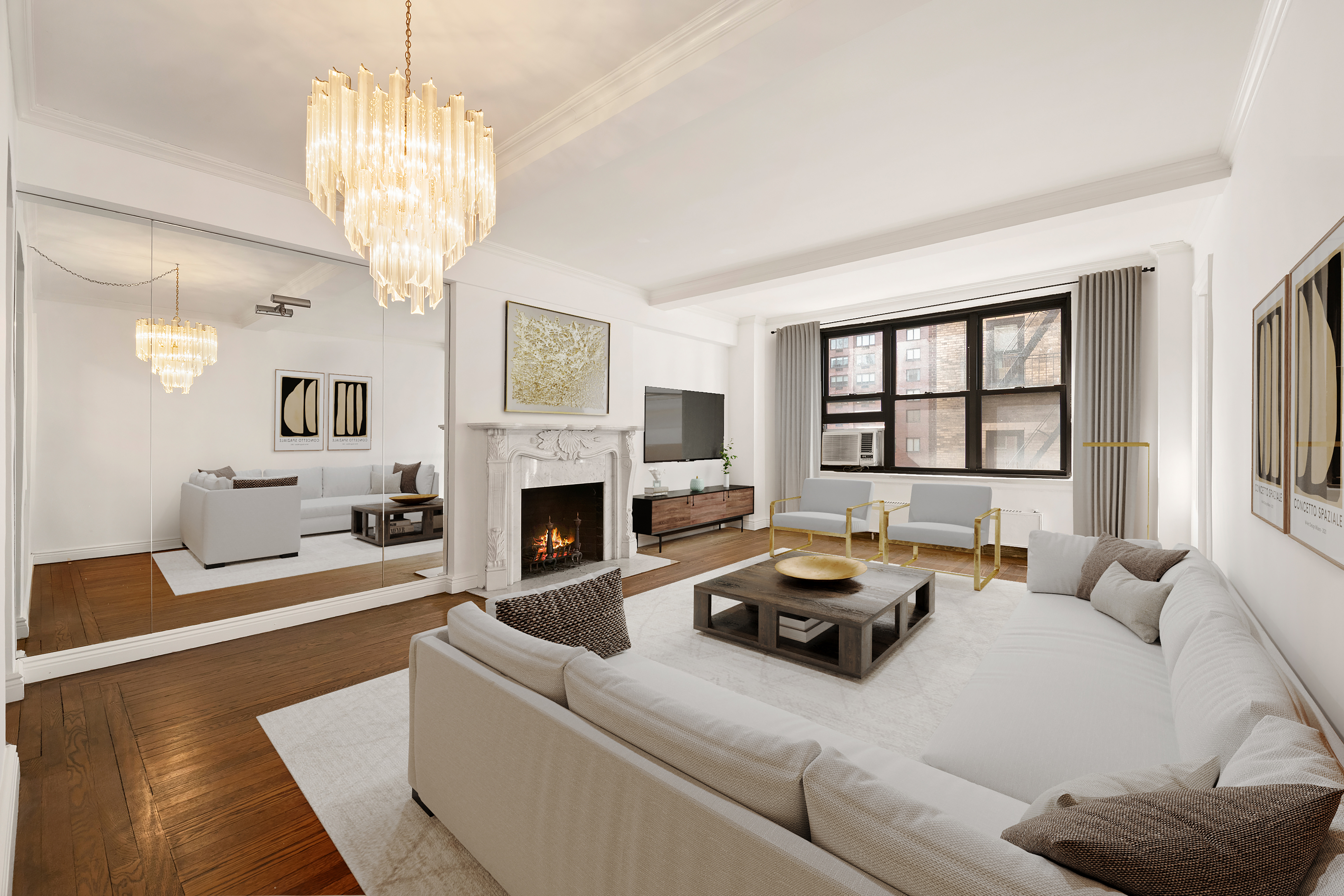 210 East 73rd Street, Unit 9EF Manhattan, NY 10021 - Photo 1 of 16 a living room with furniture a chandelier and a fireplace