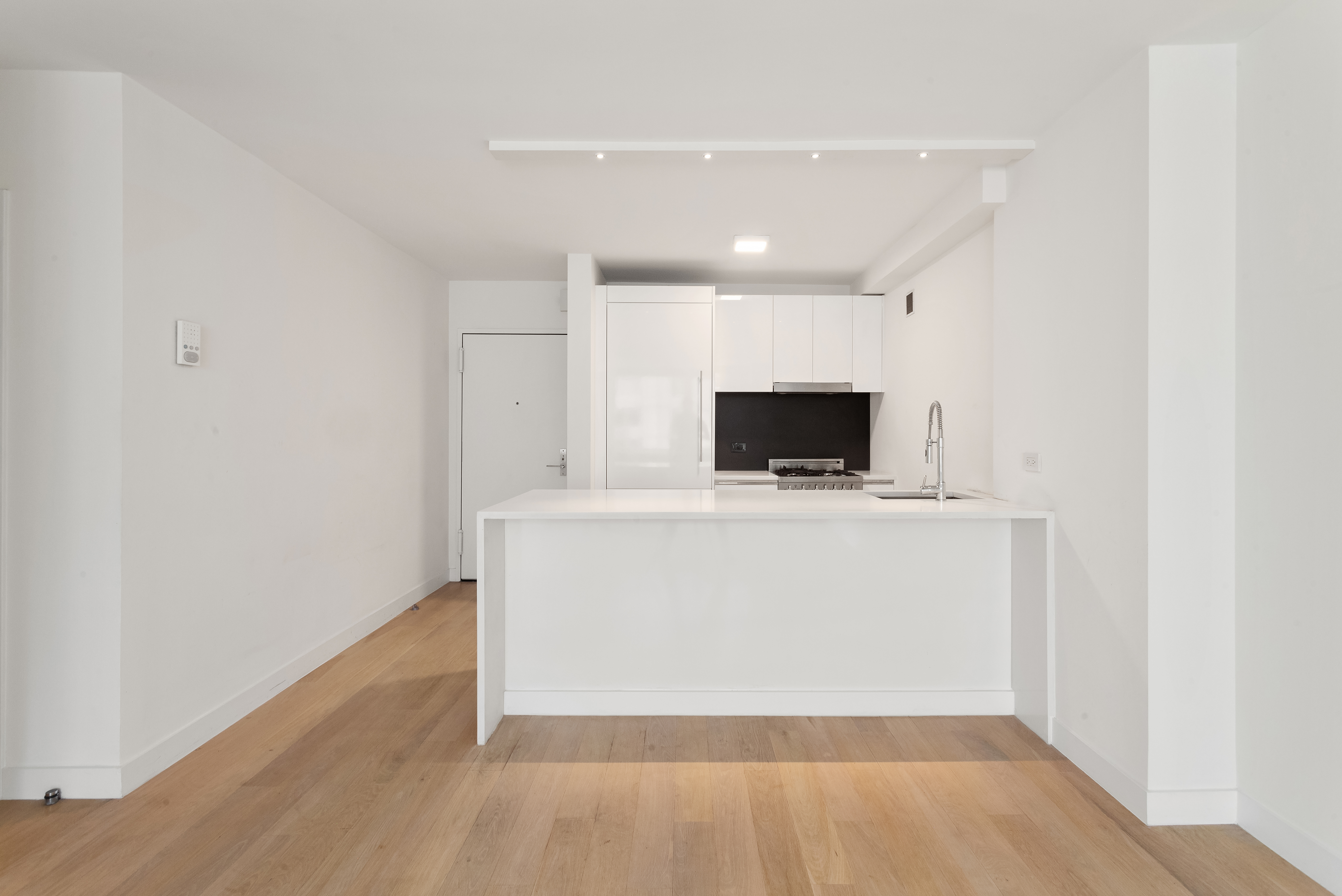 301 West 53rd Street, Unit 24H Manhattan, NY 10019 - Photo 3 of 15 a view of kitchen with wooden floor