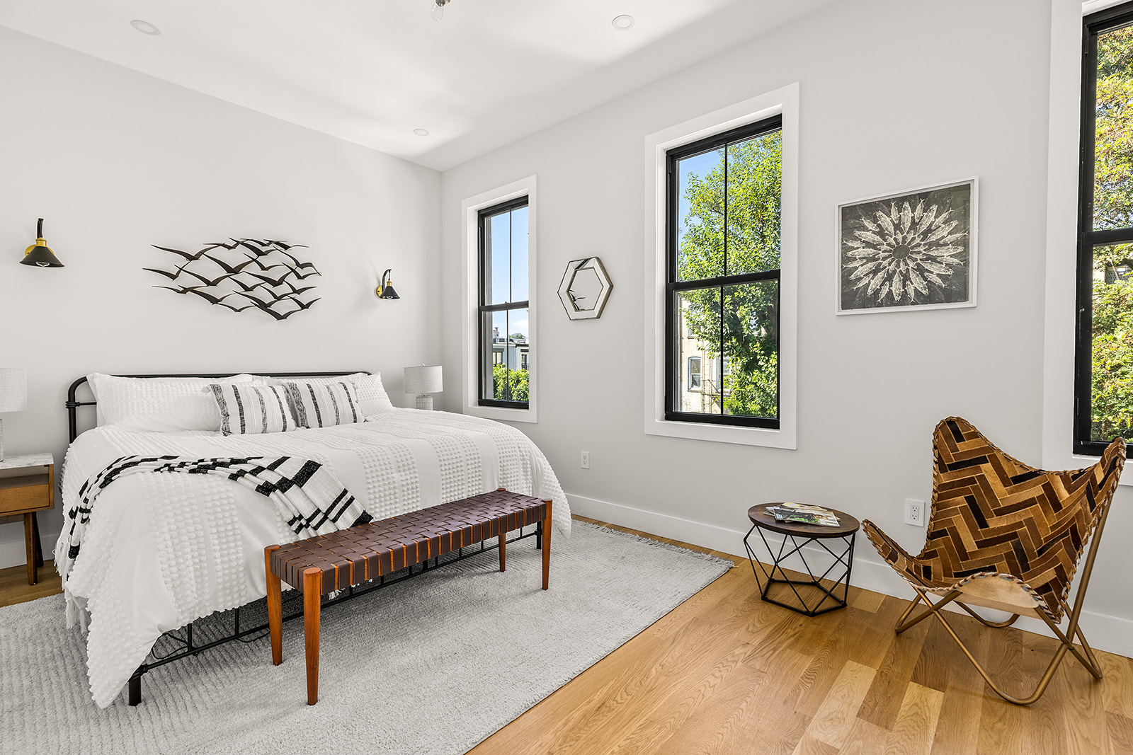 661 Decatur Street Brooklyn, NY 11233 - Photo 8 of 13 a bedroom with a bed and a window