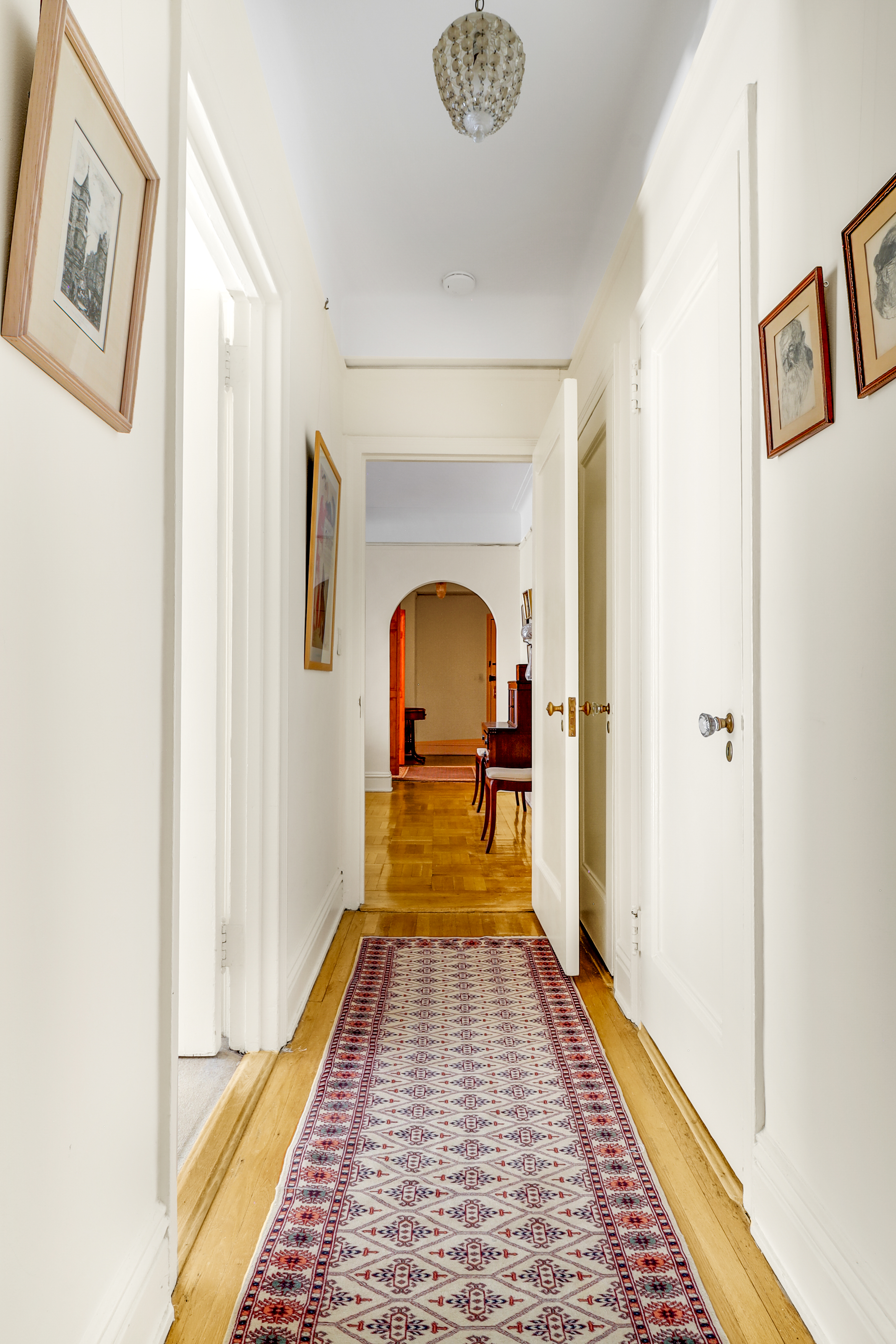 50 Riverside Drive, Unit 5E Manhattan, NY 10024 - Photo 10 of 22 a view of a hallway with wooden floor