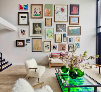 a dining hall with stainless steel appliances granite countertop a kitchen island a stove and a wooden floors